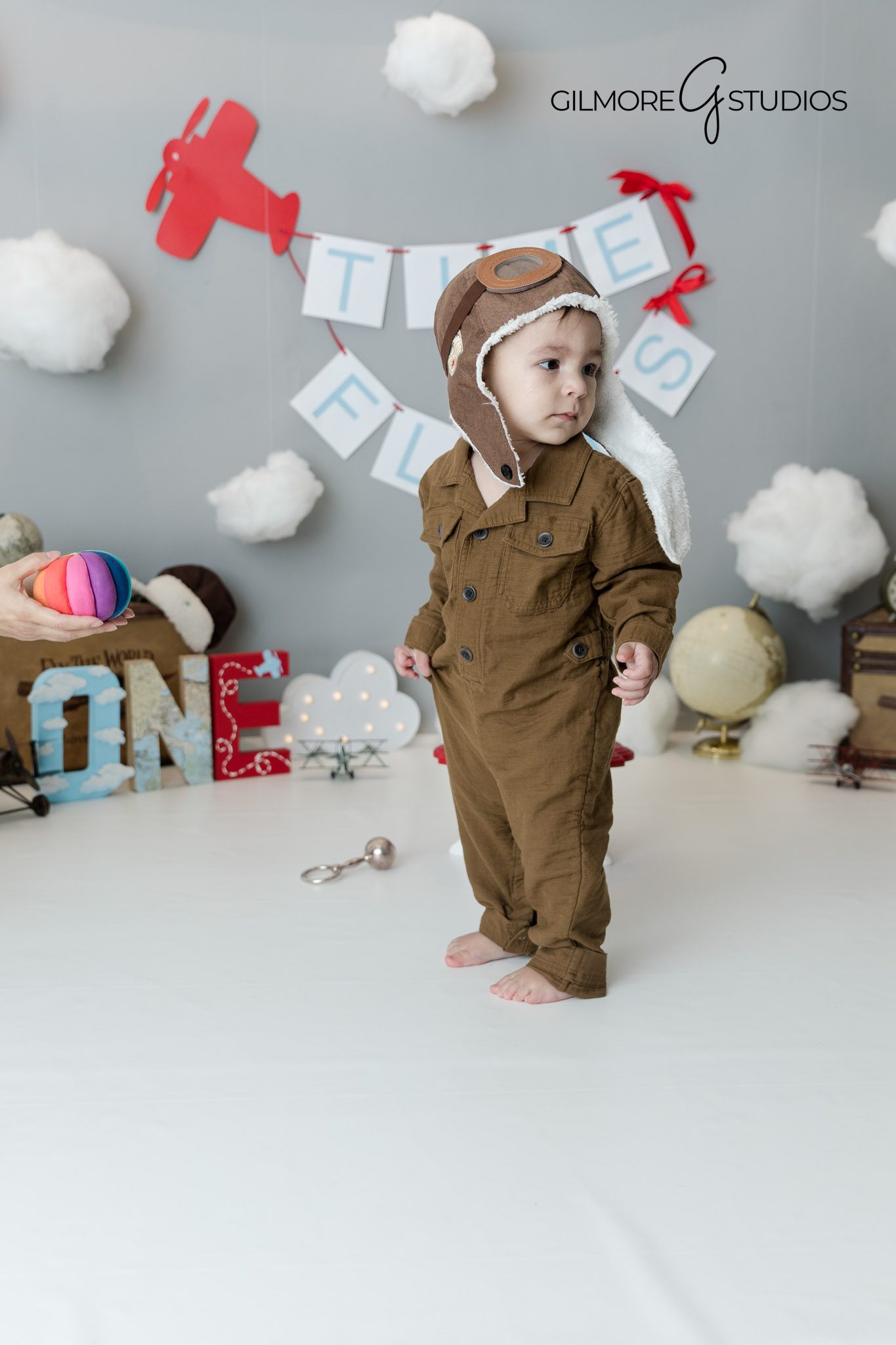 Grey Time Flies birthday portraits Gilbert AZ photographer one year baby boy session, Cake smash photography studio Gilbert Arizona grey Time Flies theme first birthday