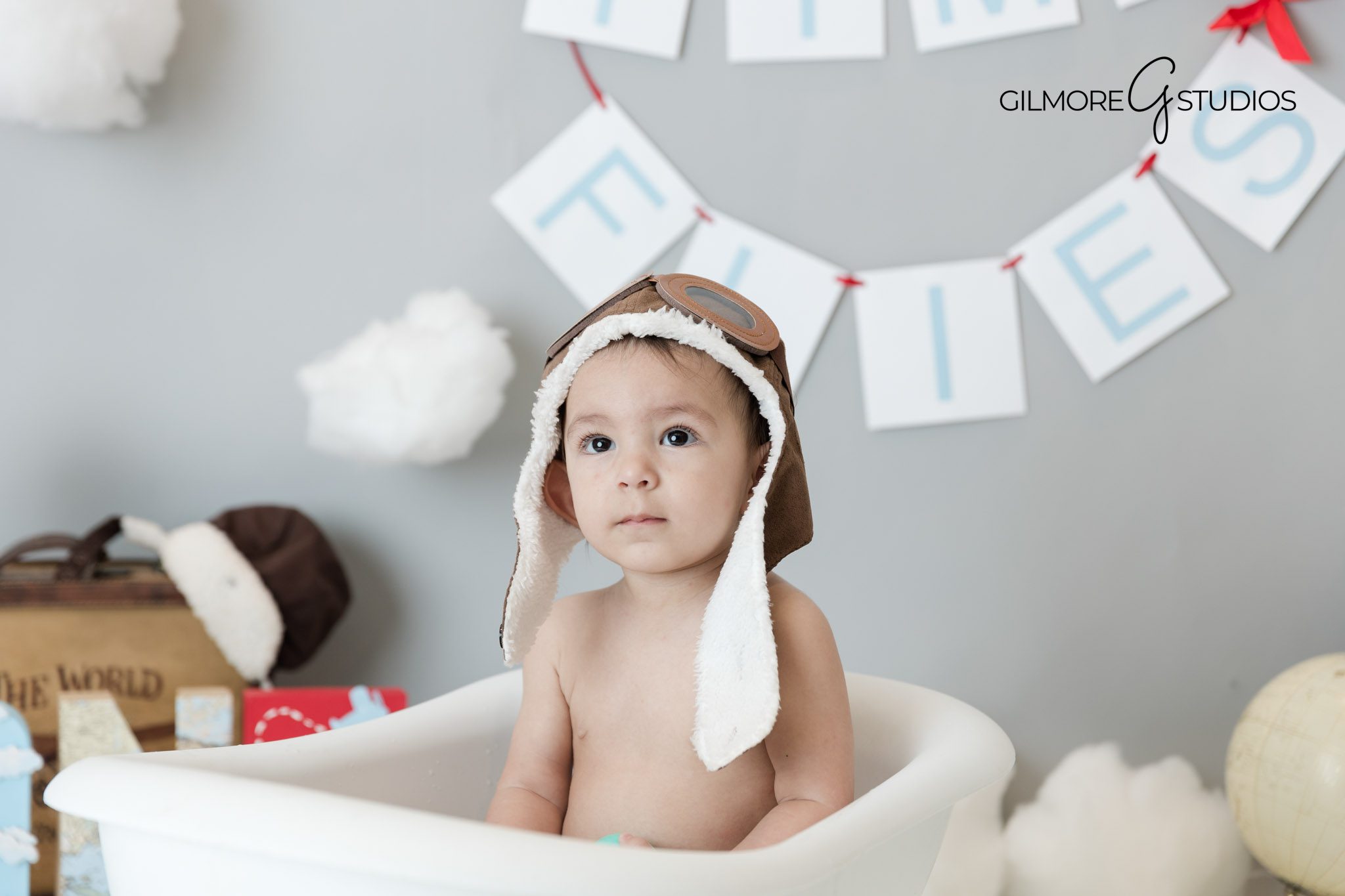 First birthday cake smash ideas for boys grey Time Flies theme photography Gilbert AZ, Baby boy milestone cake smash Gilbert AZ grey airplane birthday theme photography