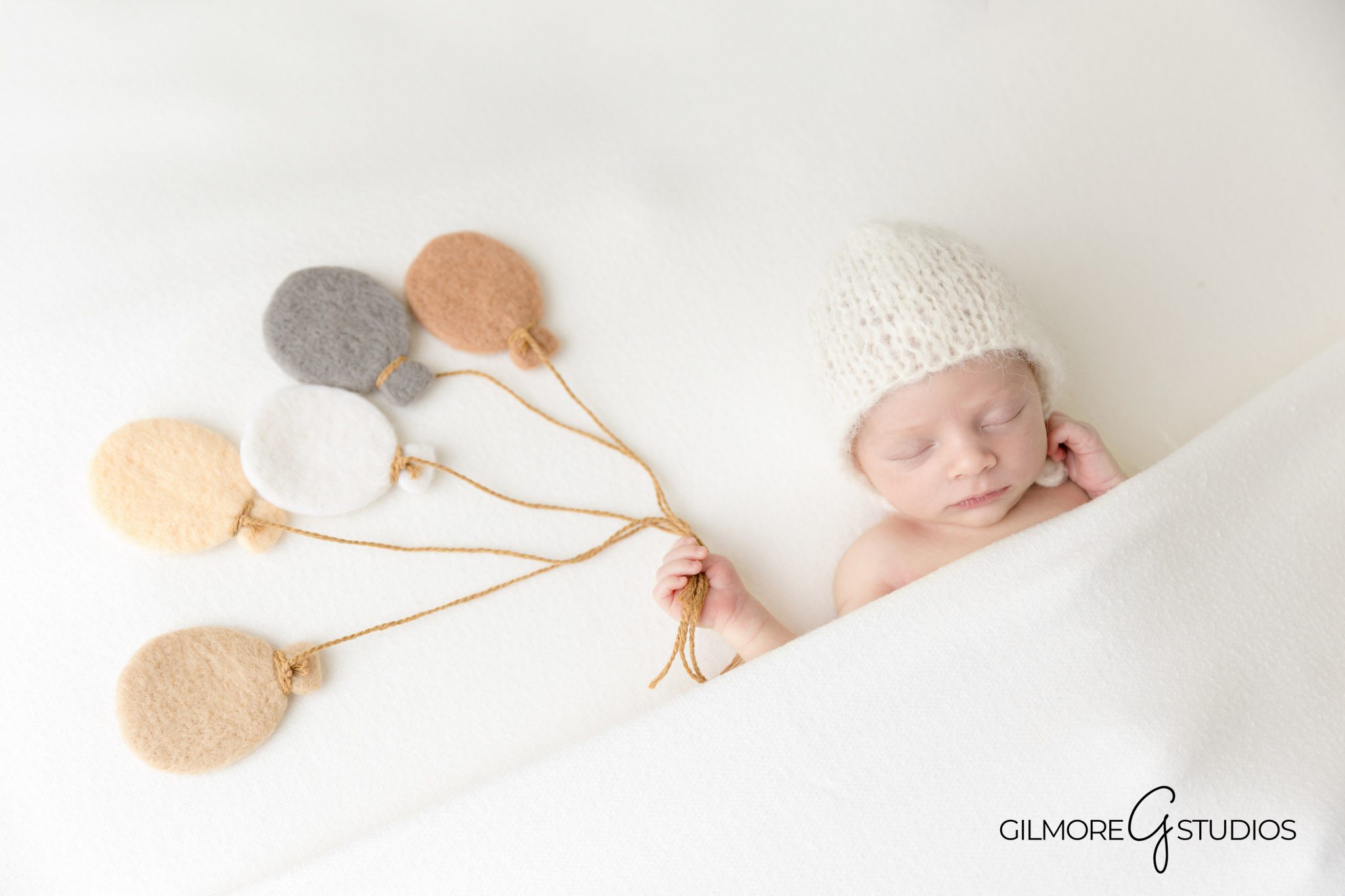 neutral tones baby portrait by Newport Coast photographer, newborn photographer with soft studio setup Newport Coast