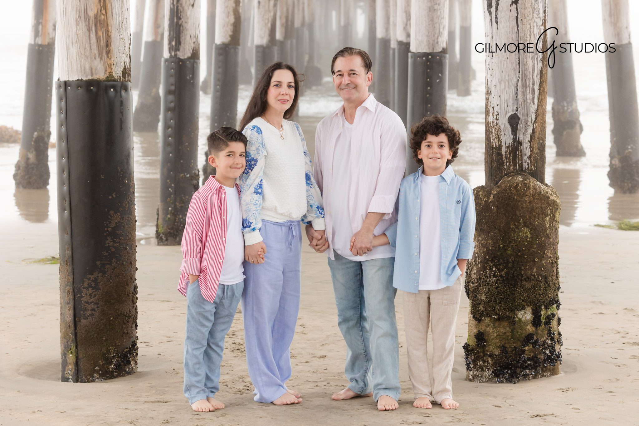 Foggy pier family photography session in Newport Beach, Newport Pier photographer capturing foggy child session