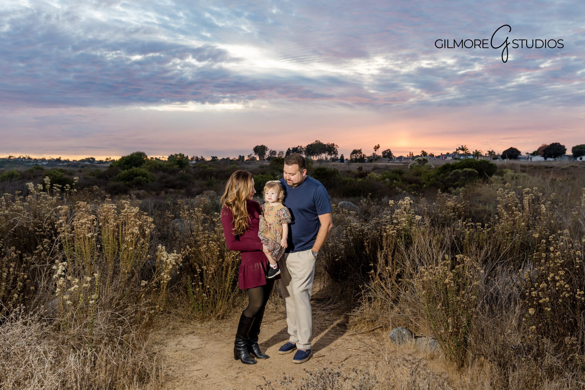 Documentary-style family photographer Costa Mesa, Toddler and parents at Back Bay family session