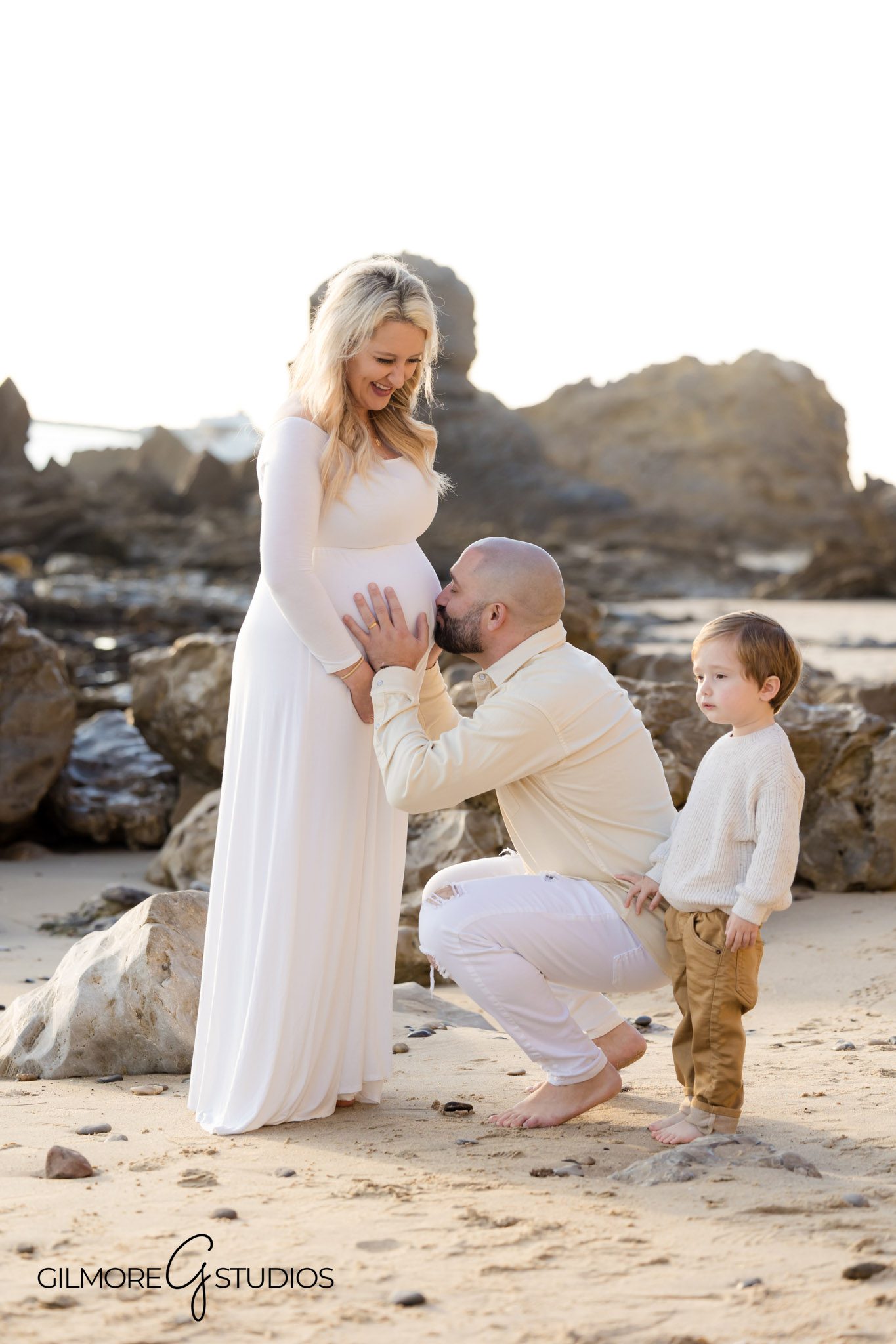 Artistic pregnancy photography with natural backdrop, Coastal maternity photography by Newport Beach photographer