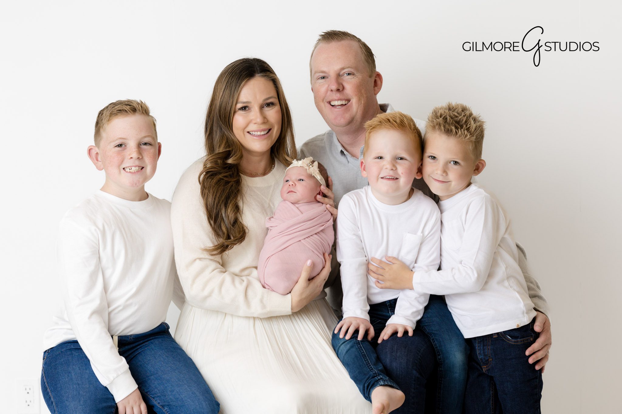 OC newborn photographer white wrap, Newport Coast baby girl in studio, family portrait photography Newport Beach, professional family baby photo session