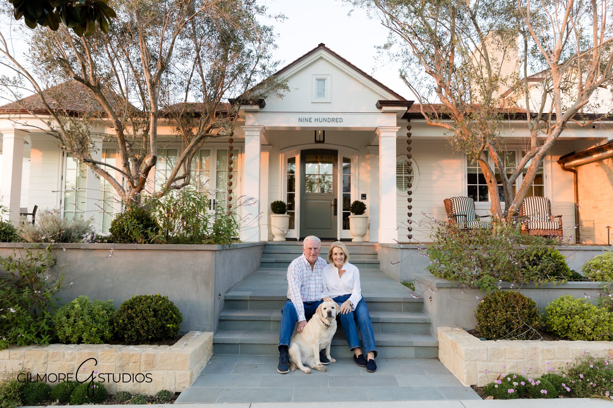 Lifestyle family photography outdoors at Corona Del Mar residence, Exterior home family portraits in Corona Del Mar