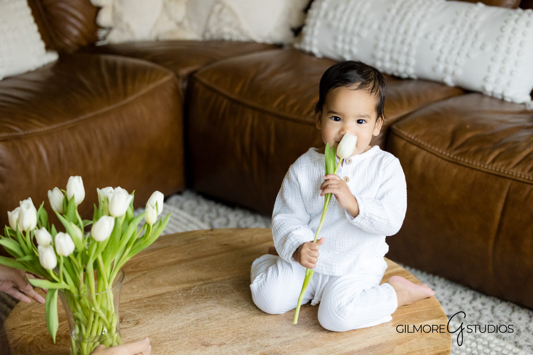 Portrait photography Gilbert Arizona with candid family joy, Lifestyle Gilbert family photographer showing playful parents and baby