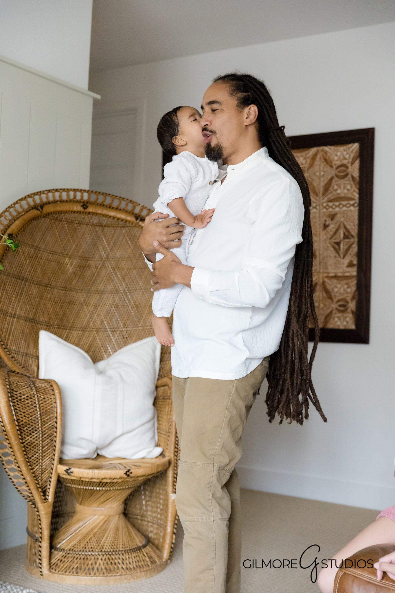 Professional family portraits Gilbert Arizona of happy family, Lifestyle photography Gilbert AZ capturing parents and children together