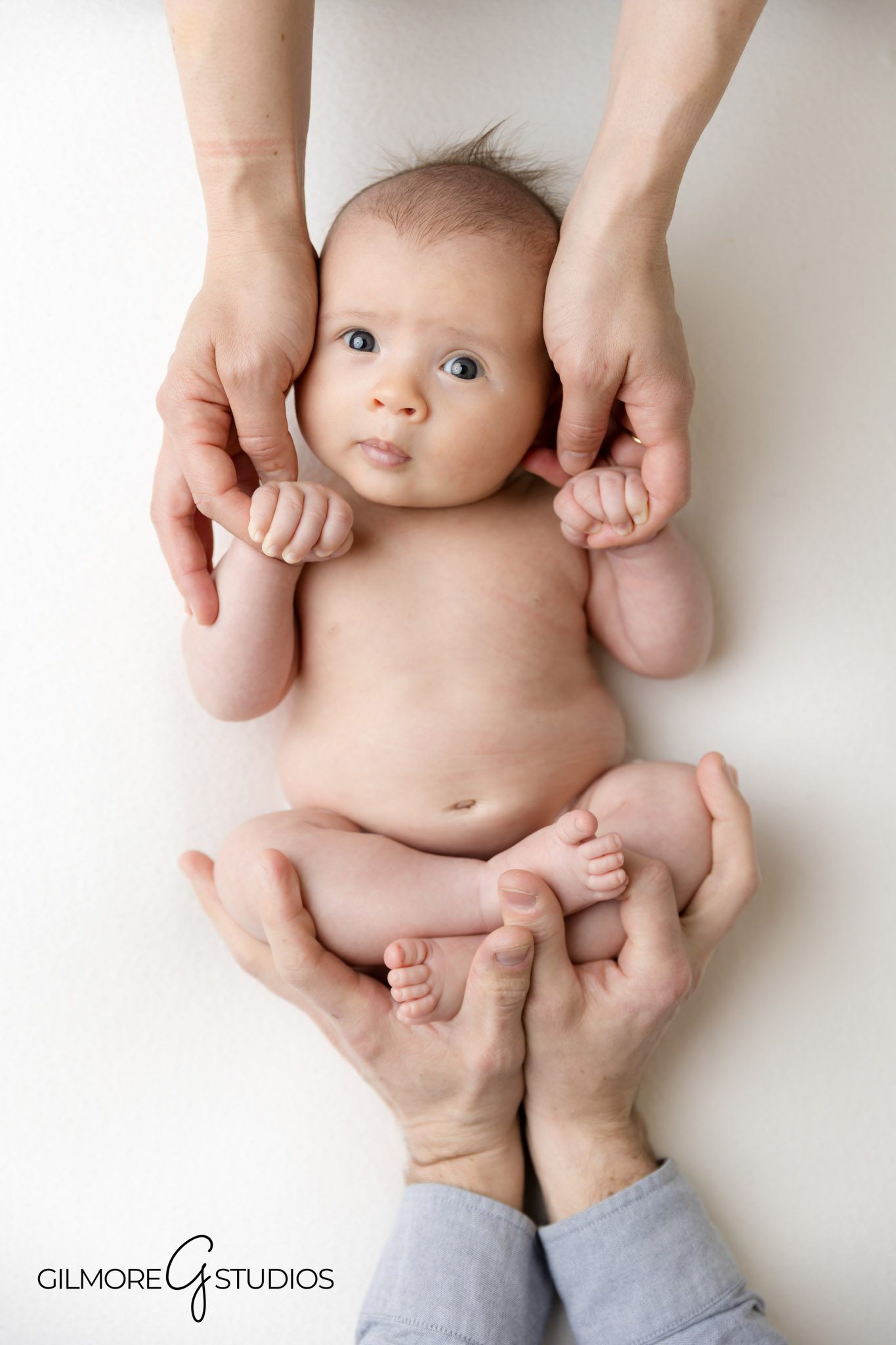 Gilbert AZ baby photographer capturing sweet newborn moments, Studio newborn portrait photography Gilbert AZ