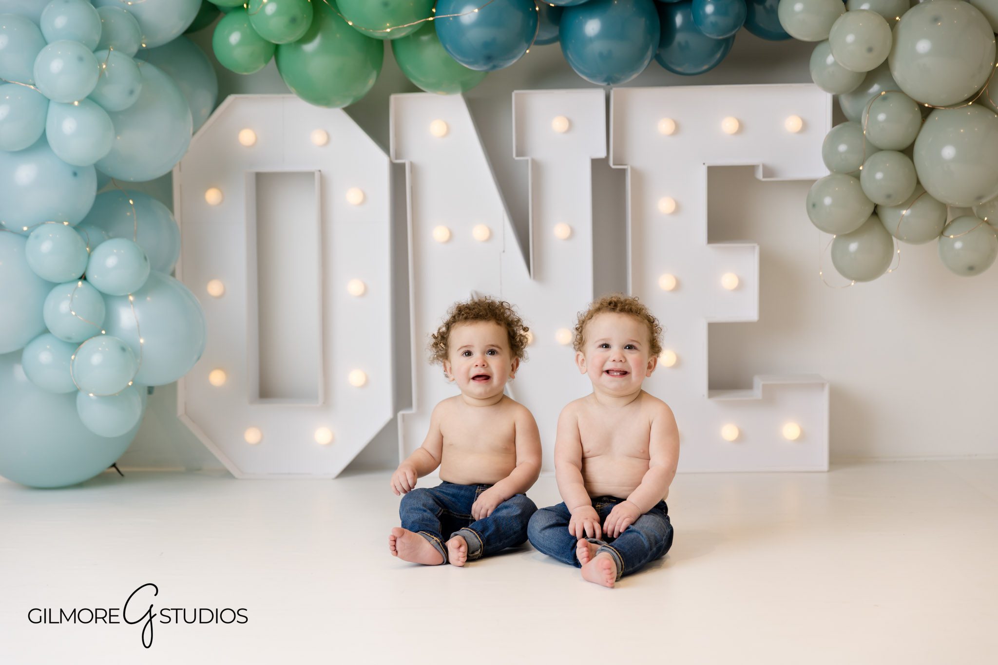 Cake smash milestone photography Newport Coast, Newport Coast twins portrait with blue and green balloons