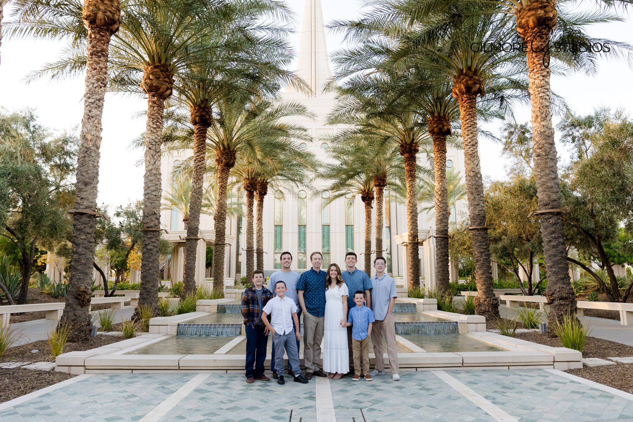 Gilbert LDS Temple family photographer capturing portraits of parents and children, Gilbert Arizona Temple family photography session outdoors