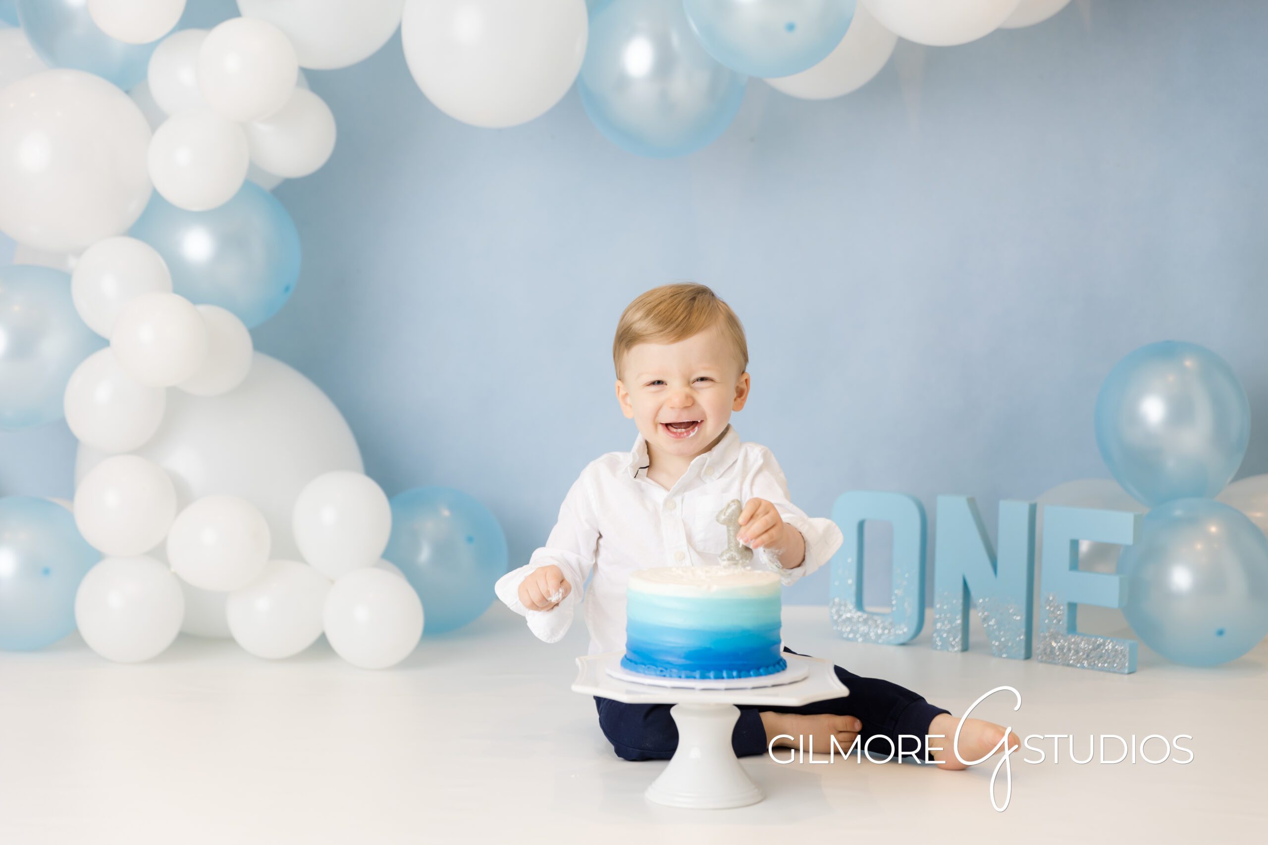 Gilbert Arizona blue cake smash photoshoot baby boy first birthday session, Baby boy cake smash Curry Gilbert AZ milestone photography portraits
