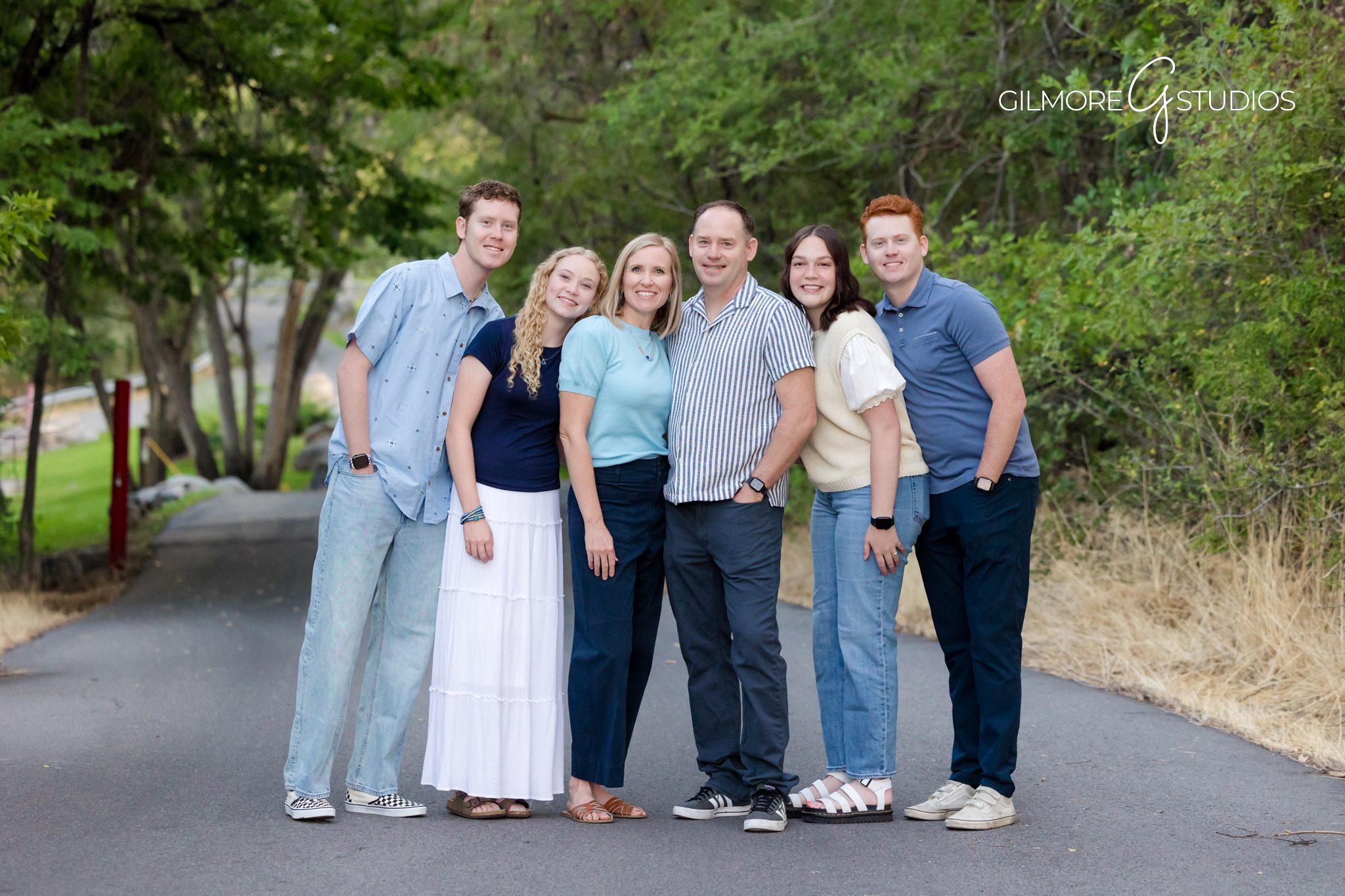 Utah Valley family photographer outdoor portraits with mountains in background, Provo Utah Valley family photo session candid portraits professional photography
