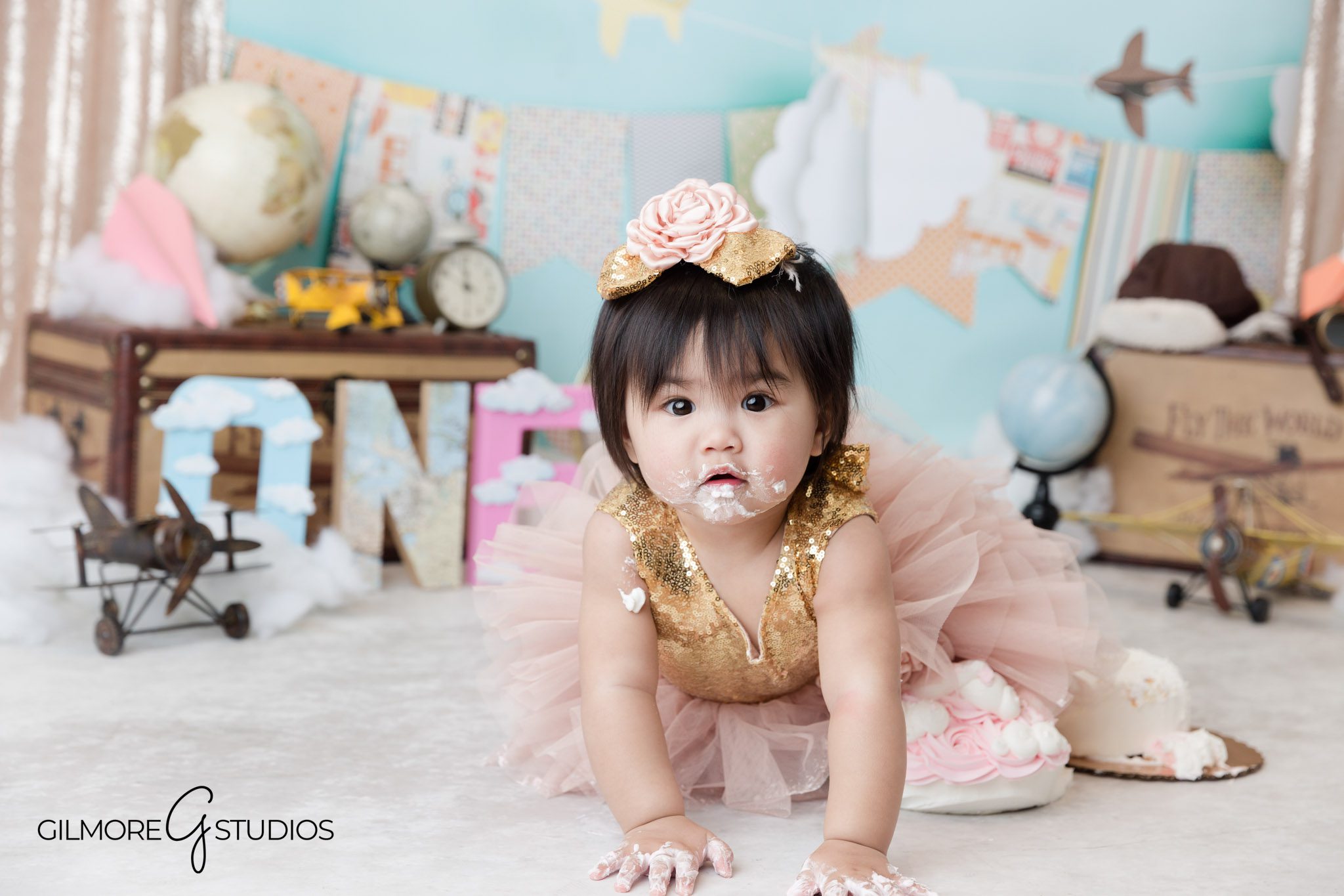 Pink Time Flies cake smash outfits Gilbert AZ baby girl birthday portraits, Gilbert Arizona photographer baby girl milestone pink Time Flies cake smash session