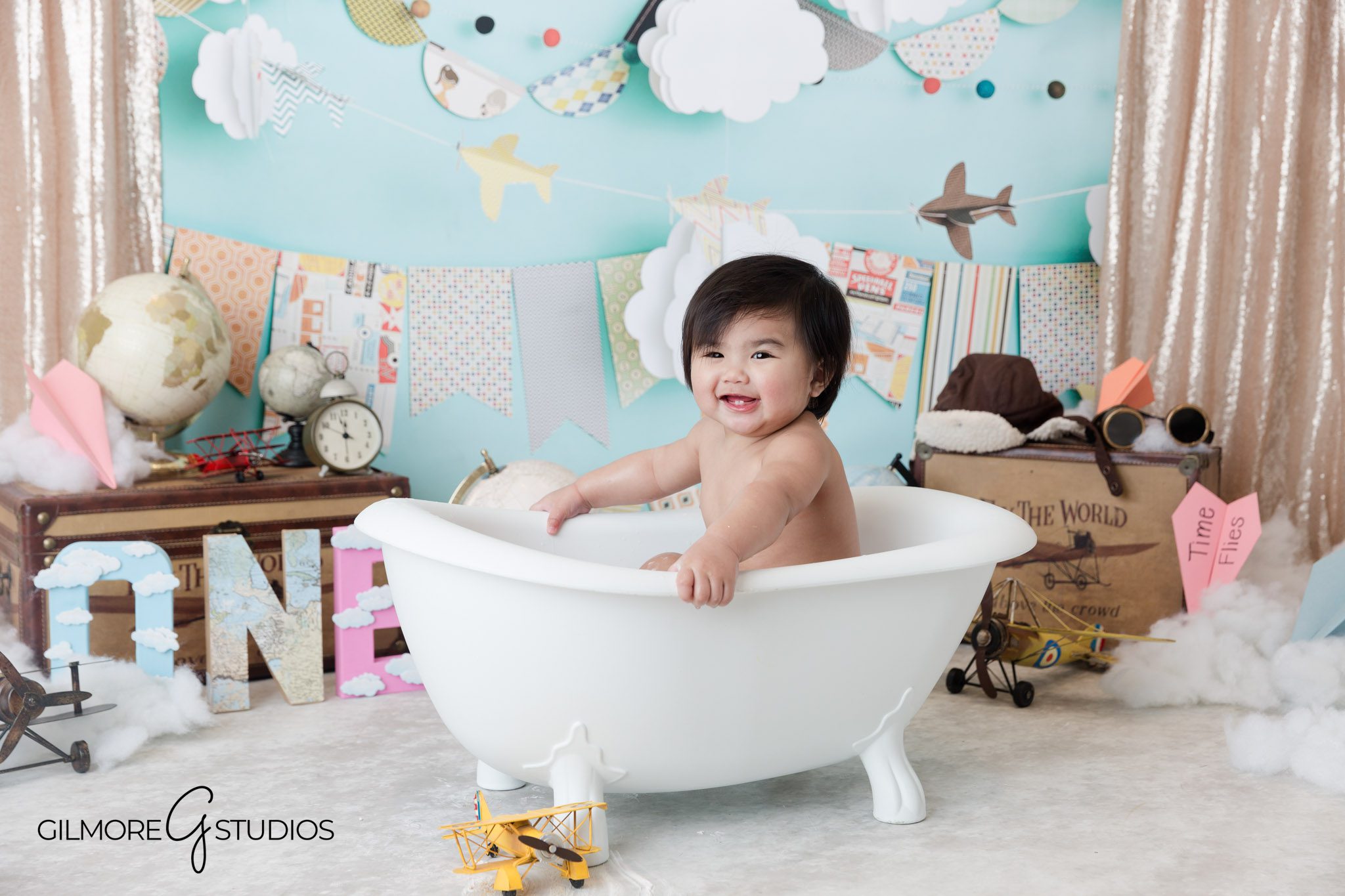 Gilbert AZ baby photographer Pink Time Flies cake smash milestone first birthday, Pink Time Flies cake smash Gilbert Arizona baby girl outdoor studio portraits