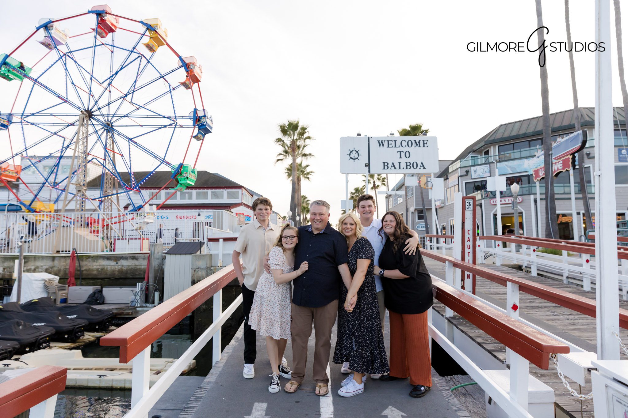Family photos Newport Beach Balboa Fun Zone professional Orange County studio
Balboa Fun Zone family portraits Newport Beach lifestyle candid photography