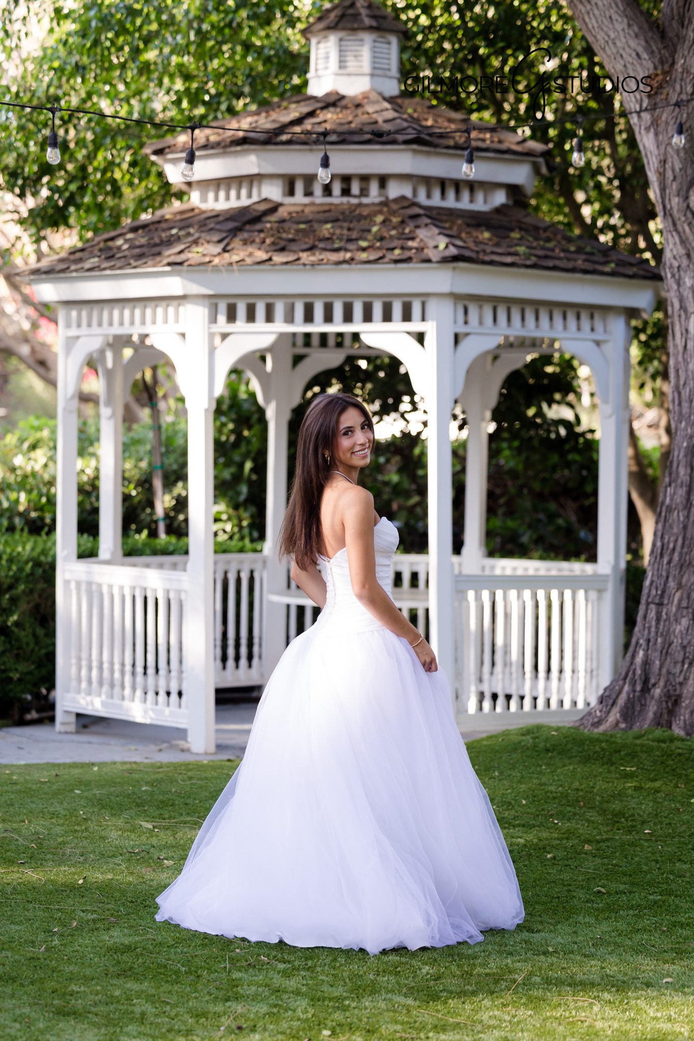 Arizona debutante photography session in formal gown with tiara
Gilbert debutante photography with floral background and soft lighting
