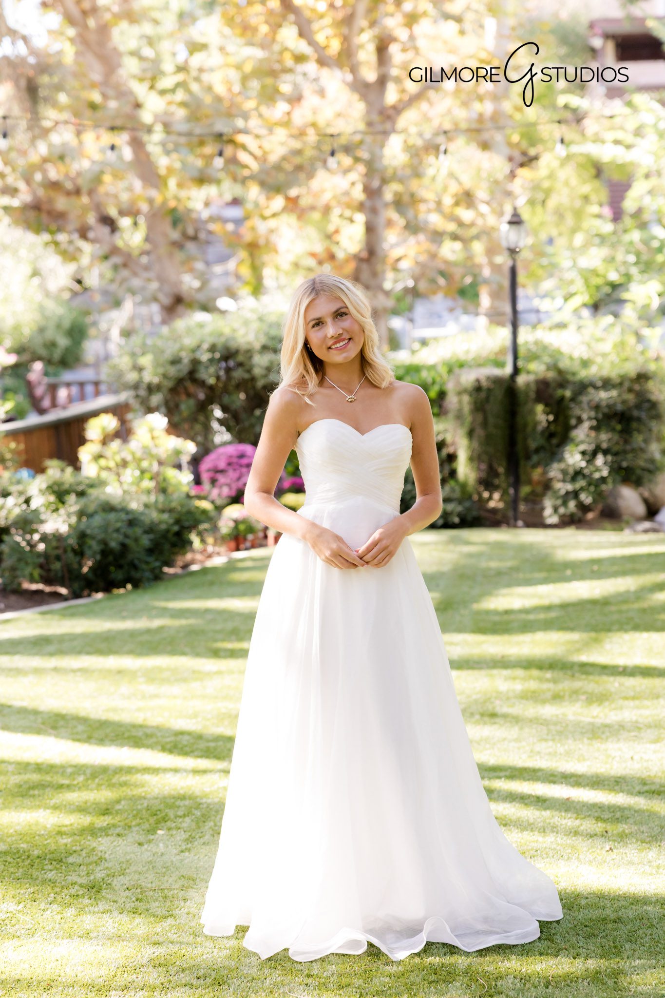 Elegant outdoor debutante photography Gilmore Studios Yorba Linda portraits

Professional debutante portraits Gilmore Studios Yorba Linda garden photography
