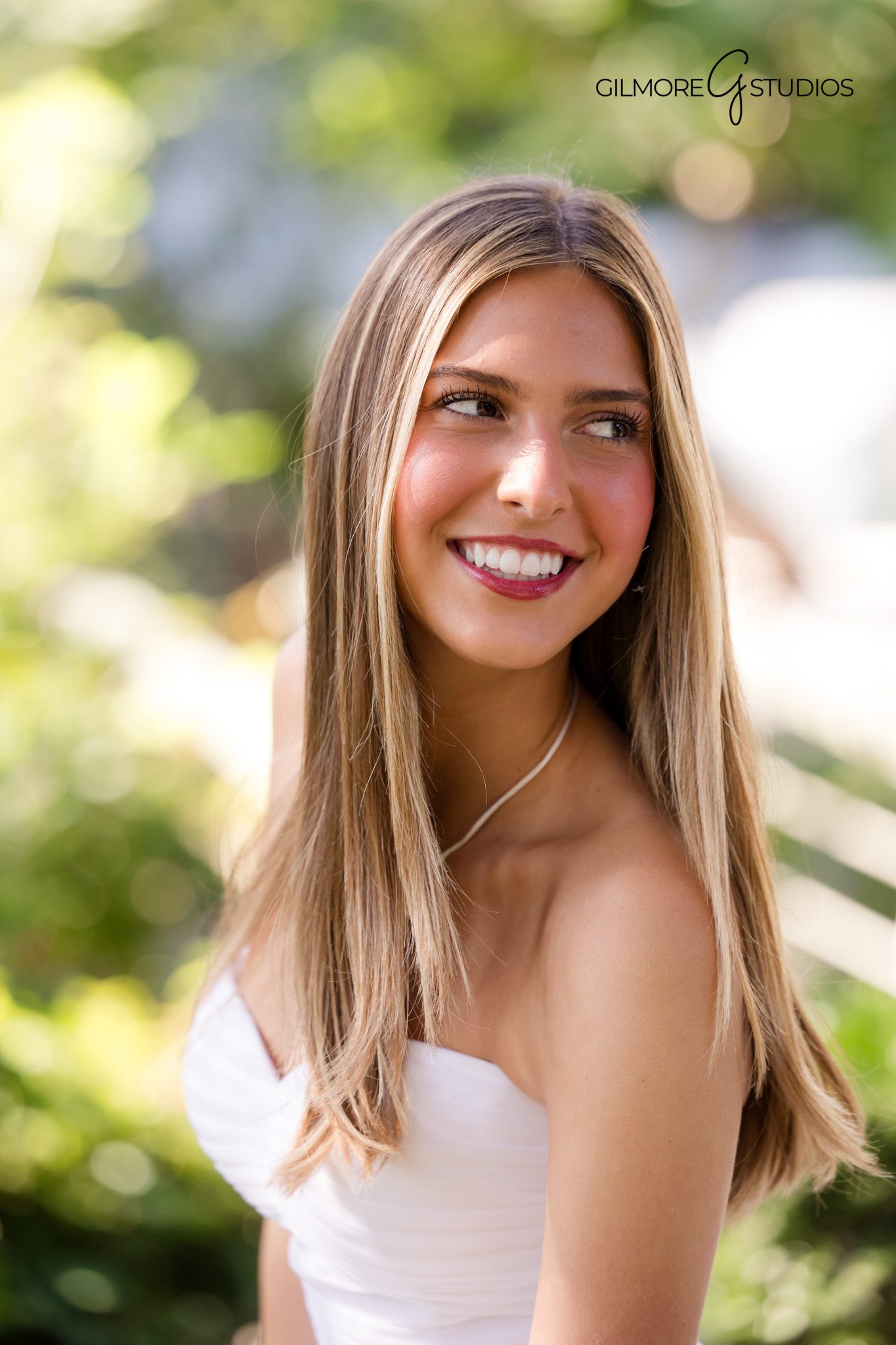 Gilmore Studios debutante photographer in Orange CA capturing outdoor portraits

National Charity League debutante portrait in California garden