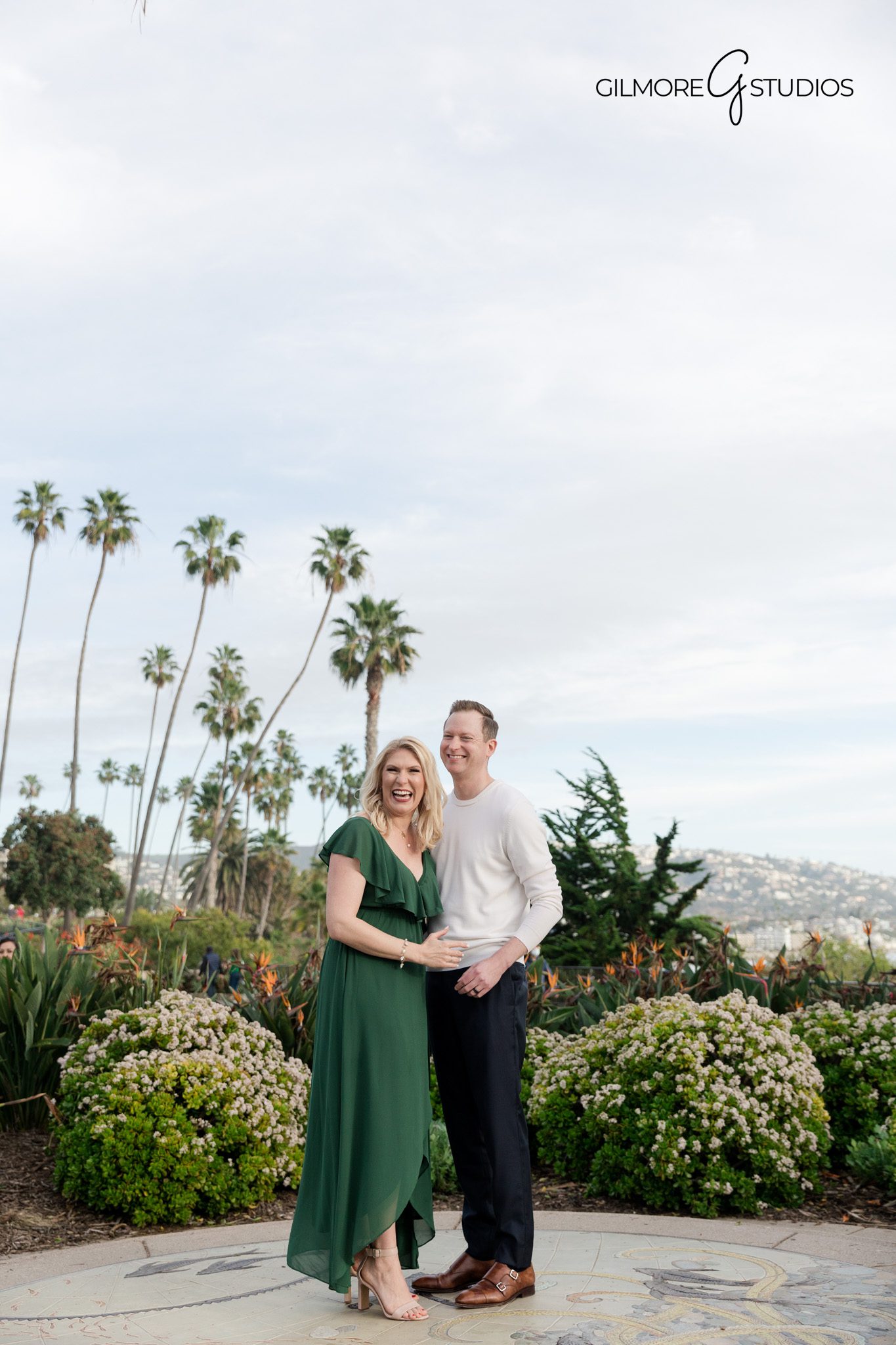 Gilmore Studios romantic engagement photo session at Lido Island

Couple walking by the shore during Orange County engagement photography