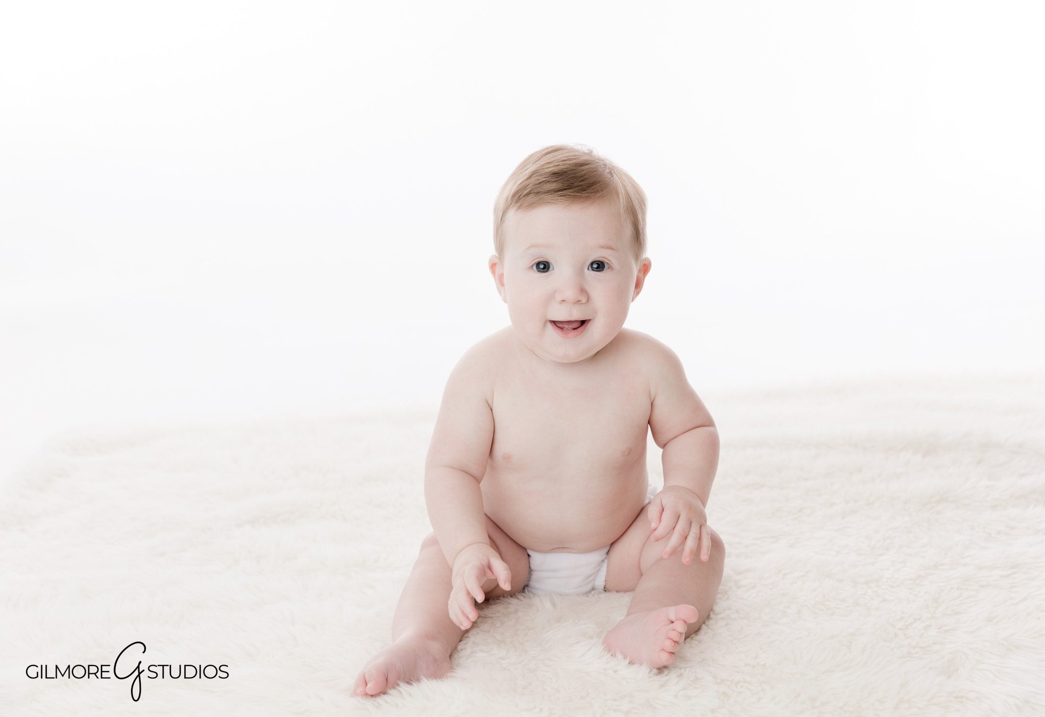 Six-month milestone baby boy portraits by Gilmore Studios Gilbert
Baby boy studio portraits with natural tones Gilbert AZ photographer