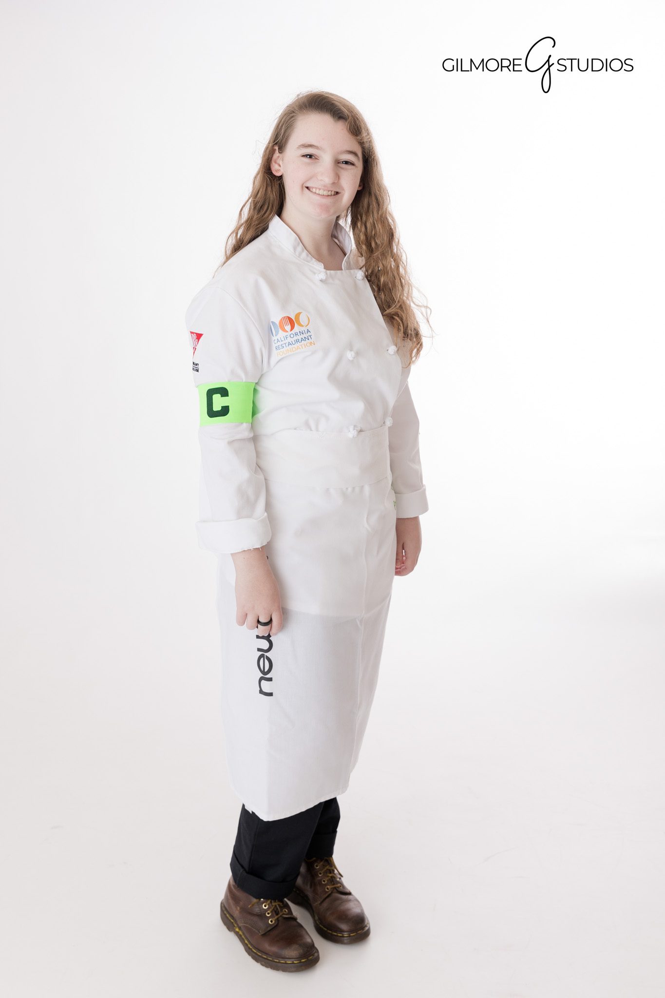 Senior portraits for girls with modern city backdrops Gilmore Studios Orange County
High school senior girl posing for modern urban portraits by Gilmore Studios