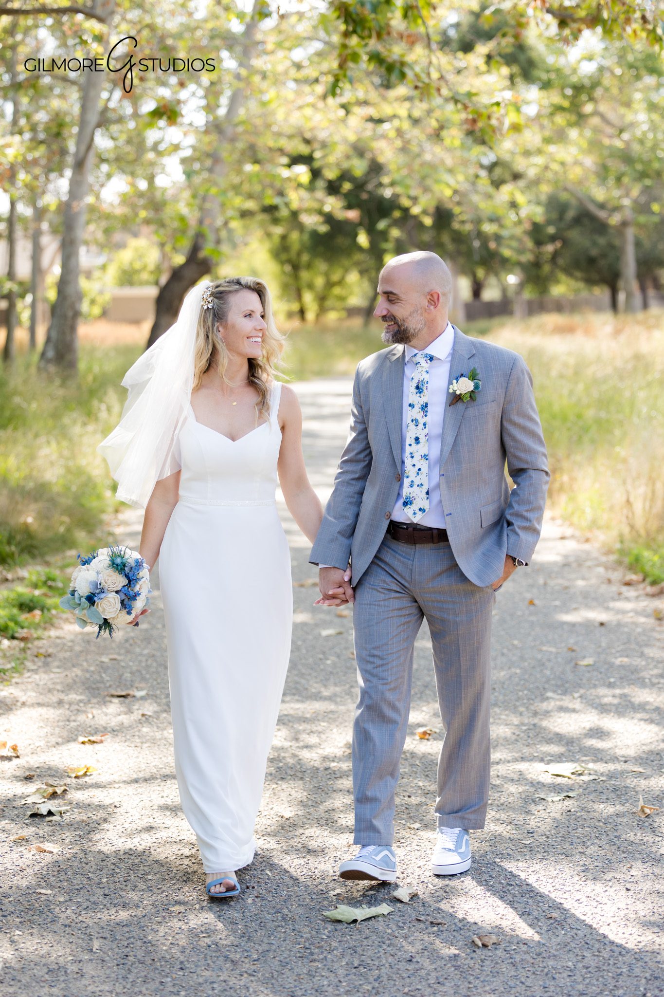 Gilbert AZ photographer capturing relaxed second wedding portraits at sunset.

Candid second wedding photography showing natural connection between couple.