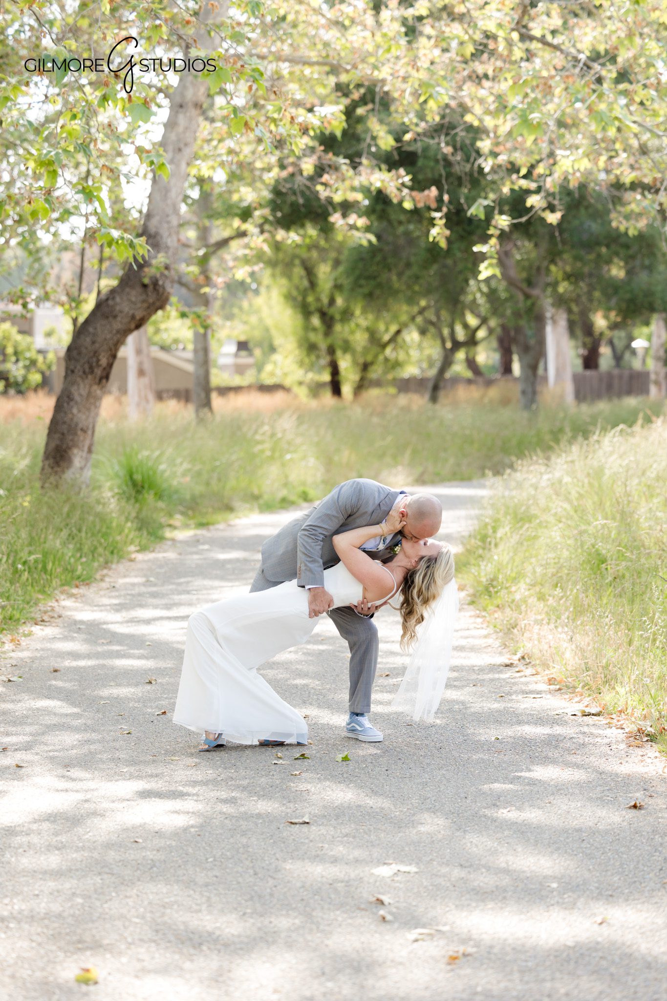 Professional photographer documenting emotional moments during remarriage celebration.

Romantic second wedding portraits photographed in warm Arizona light.