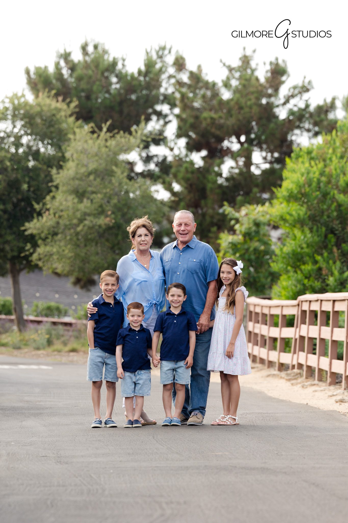 Newport Beach portrait photographer capturing family on hilltop trail.

Castaways family photography showing warm golden sunset light.