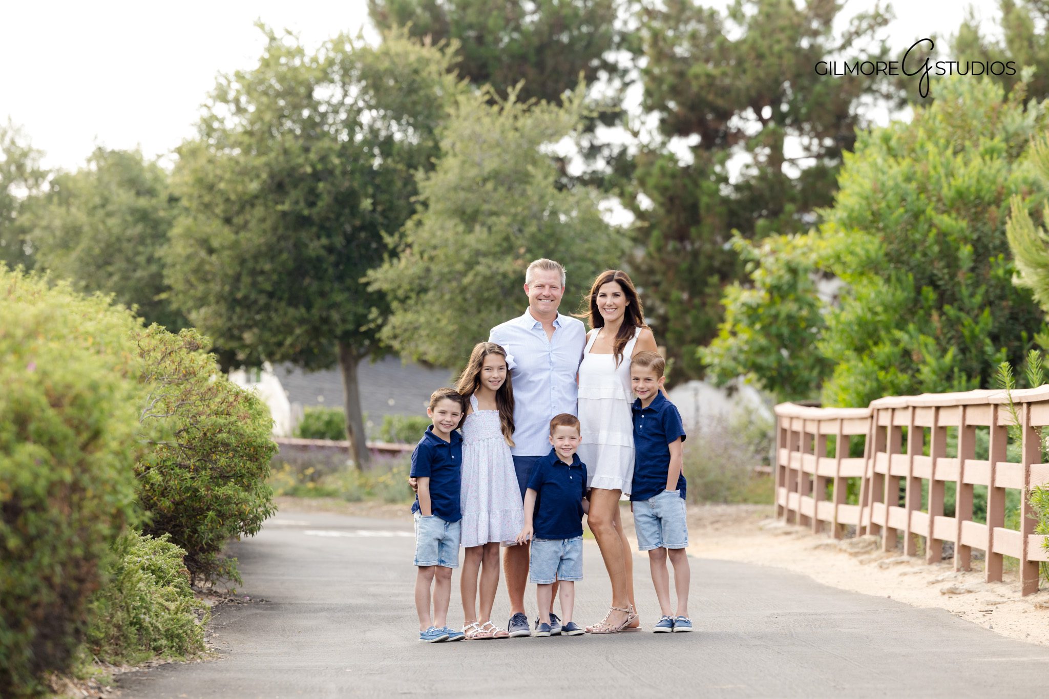Family photography showcasing Castaways coastal overlook at sunset.

Newport Beach family photographer capturing parents snuggling kids.