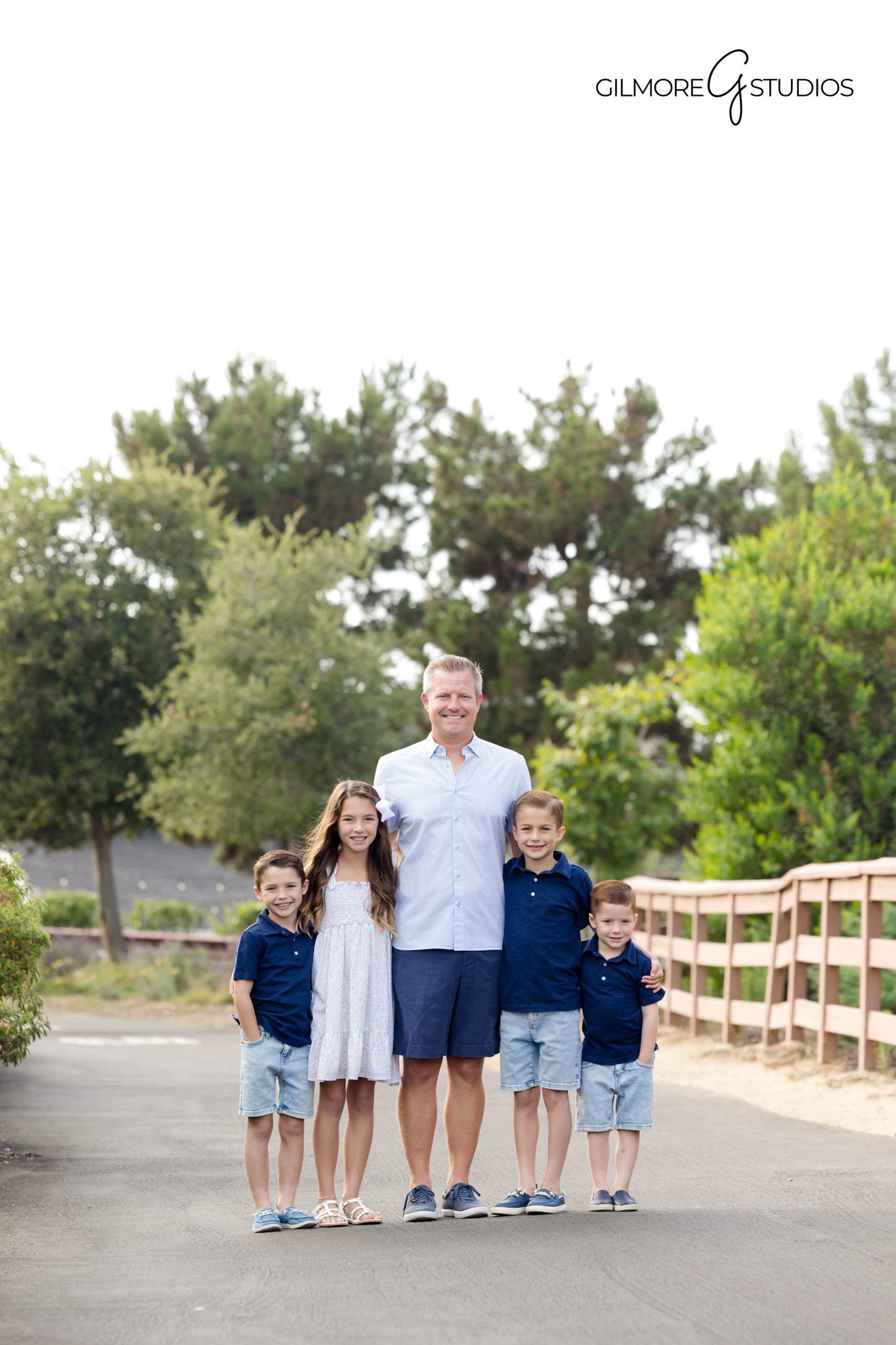 Newport Beach photography showing sweeping harbor landscape behind family.

Castaways family photographer capturing calm emotional portraits.