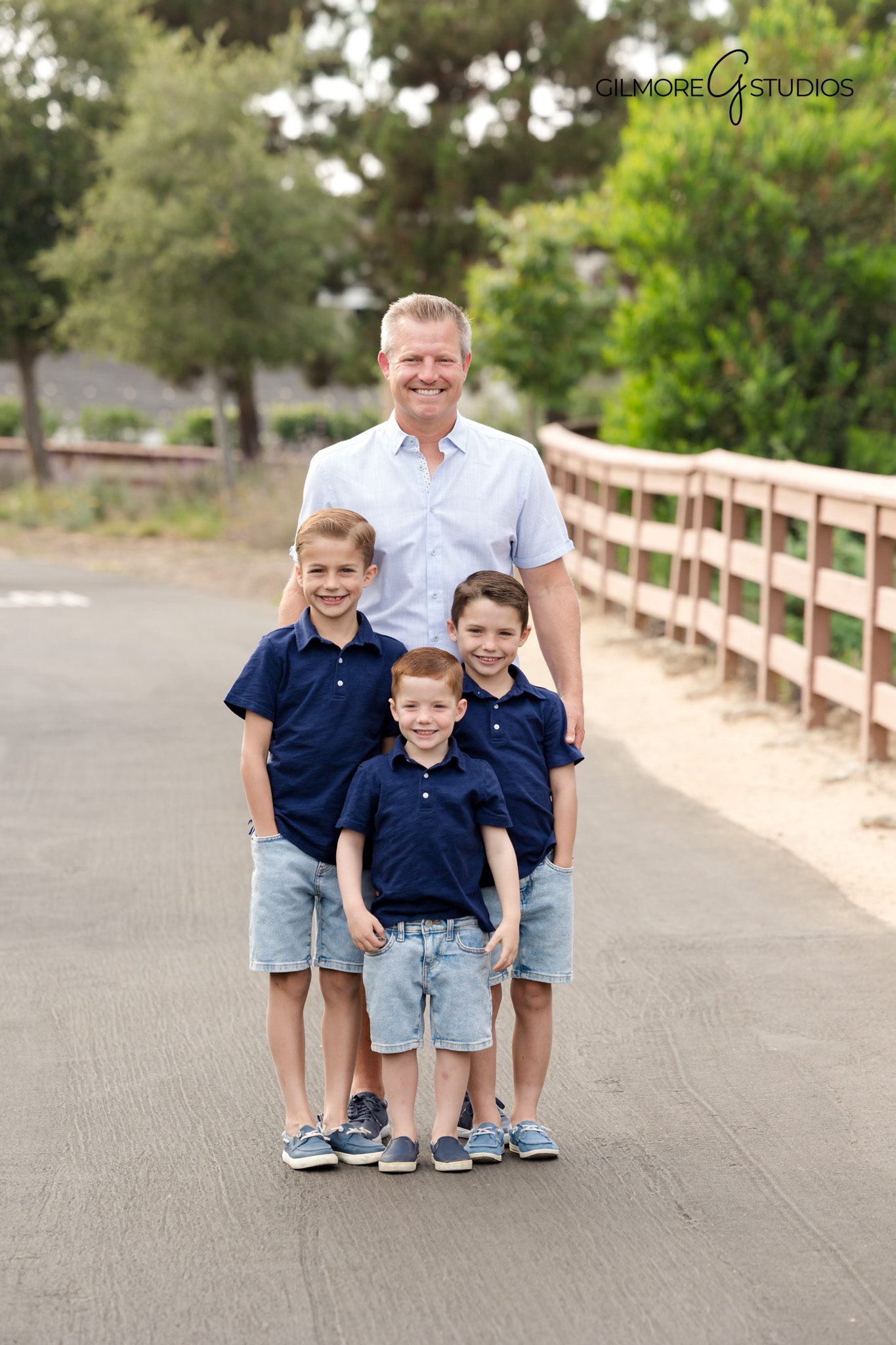 Family portrait photography on elevated Newport cliffside trail.

Newport Beach photographer capturing soft warm backlighting.