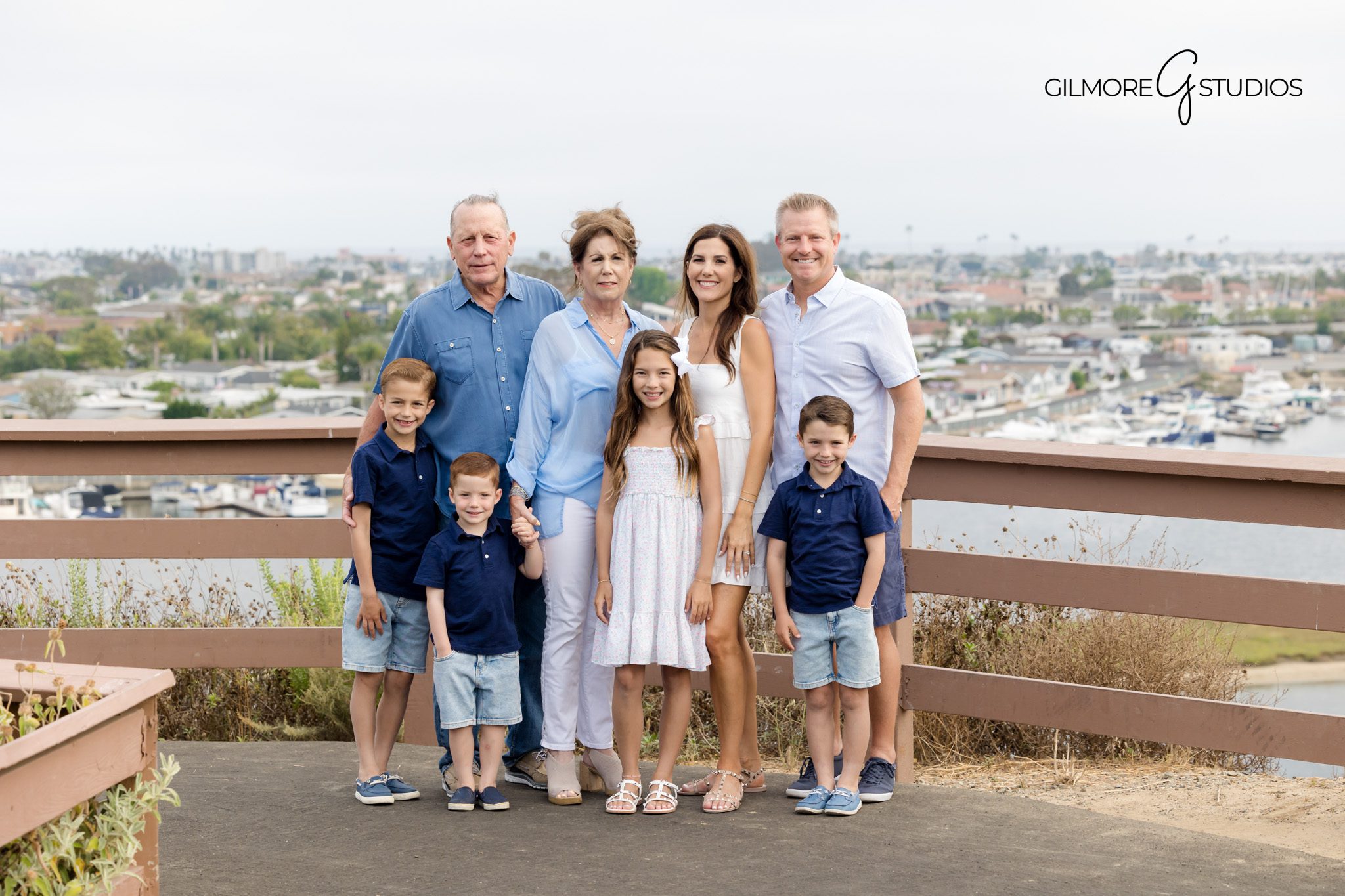 Castaways photographer documenting candid family connection at sunset.

Family portrait photography capturing warm natural interaction.