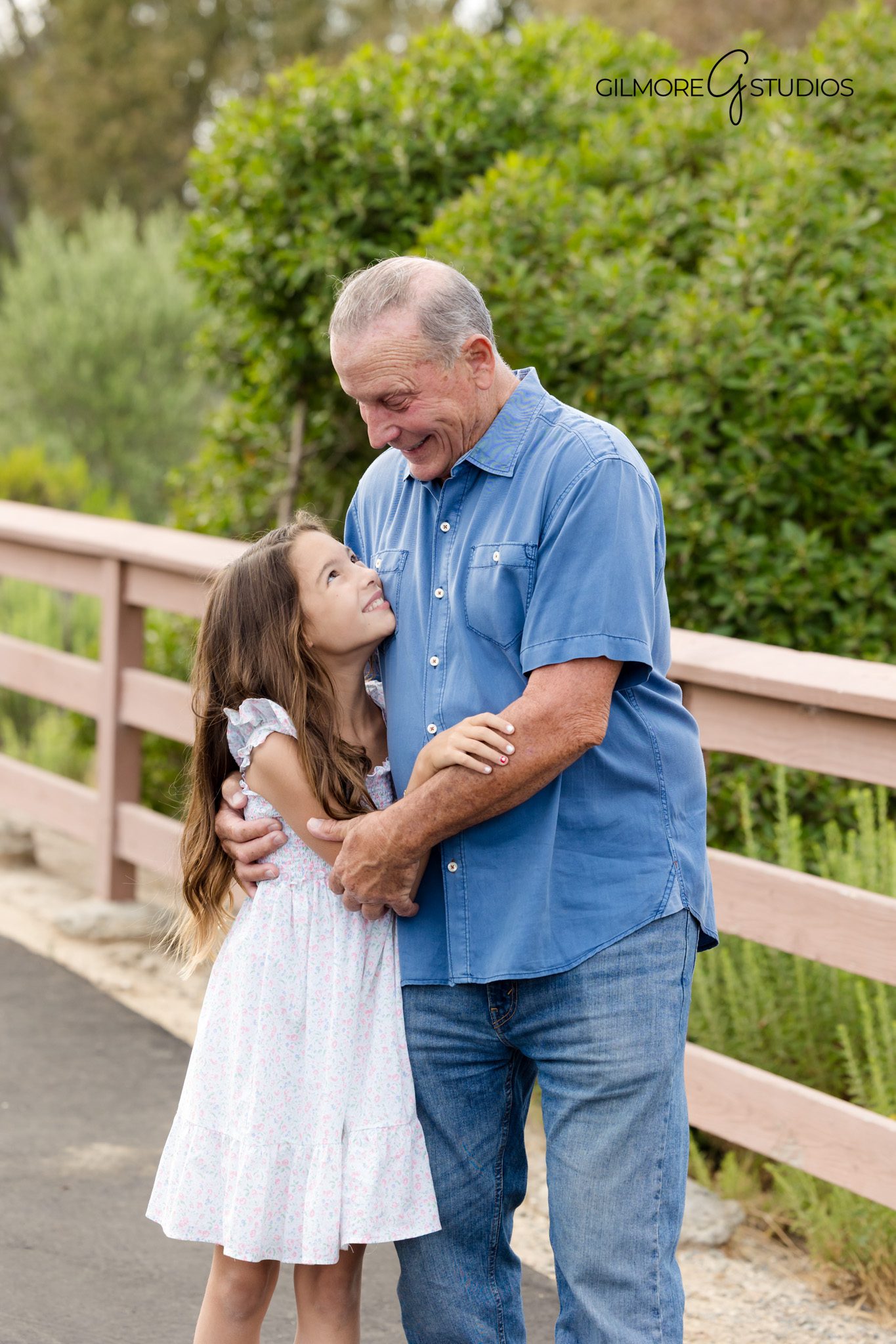 Newport Beach family photography with nature inspired setting.

Castaways portrait photographer capturing backlit sunset family moment.