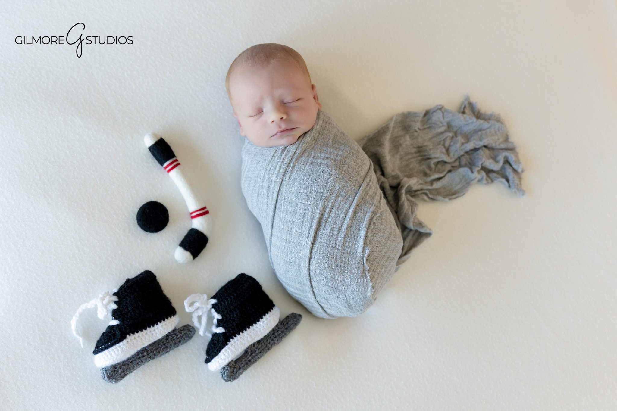 san diego photography documenting newborn resting on soft blanket,

lifestyle portrait photographer capturing authentic newborn expressions,