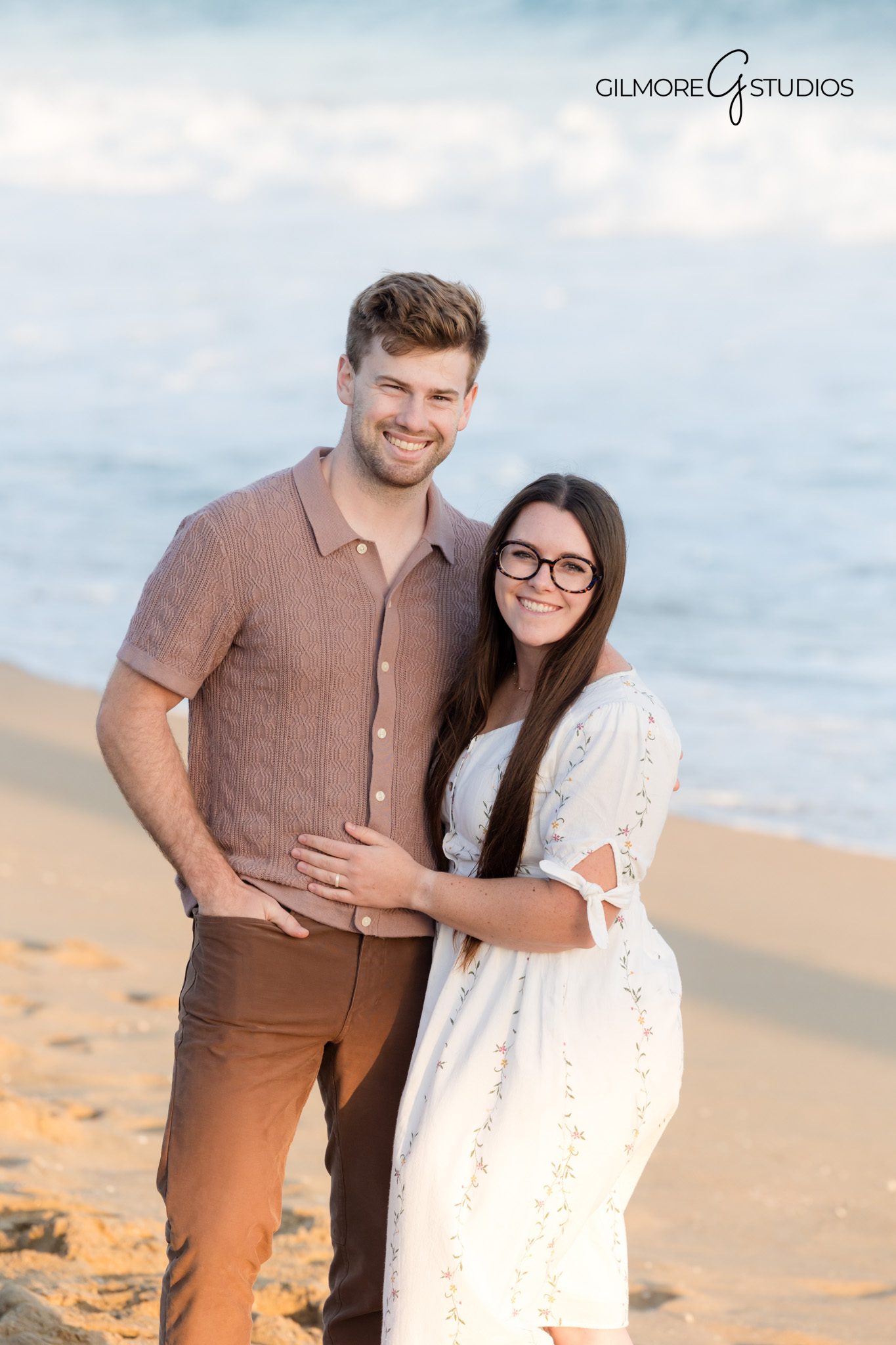 Newport Beach Pier photography showcasing natural family interaction.

Family portrait photographer capturing candid movement on the beach.