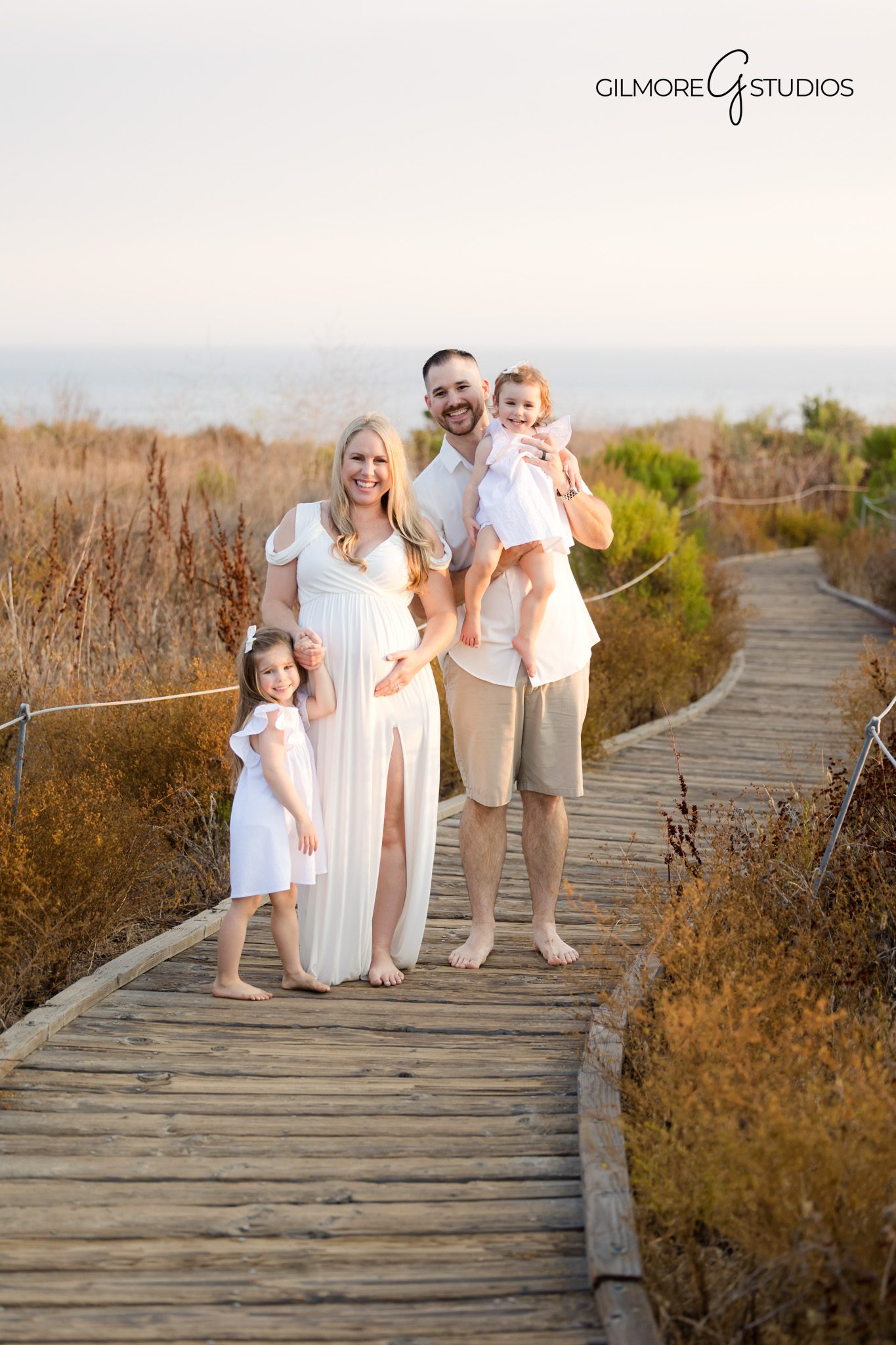 Natural light maternity photographer capturing beach session at Crystal Cove,

Crystal Cove photography showing expecting mother near tide pools,