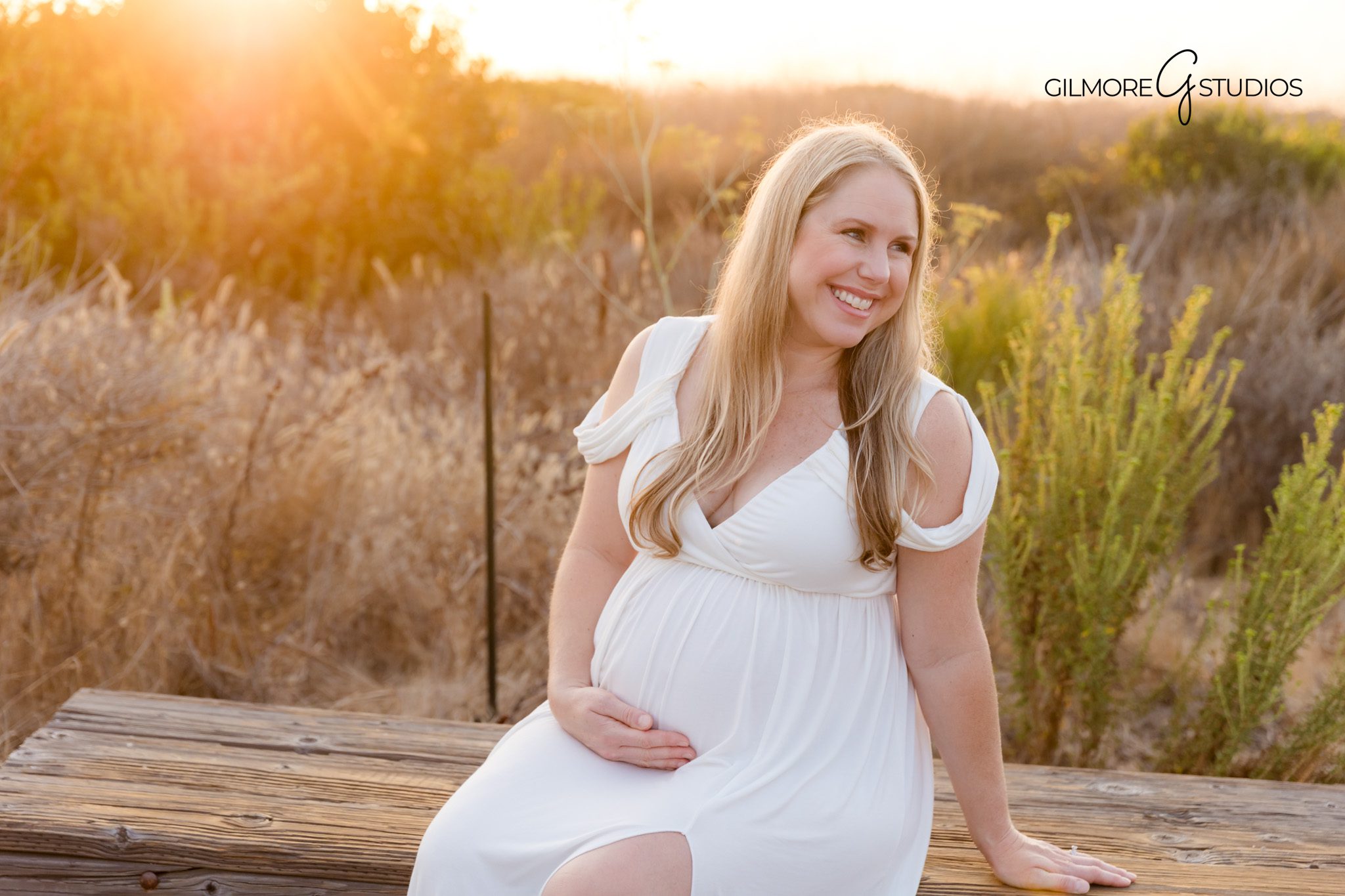 Orange County maternity photographer capturing sunset pregnancy portraits at Crystal Cove,

Crystal Cove maternity photography showing glowing mother in coastal light,