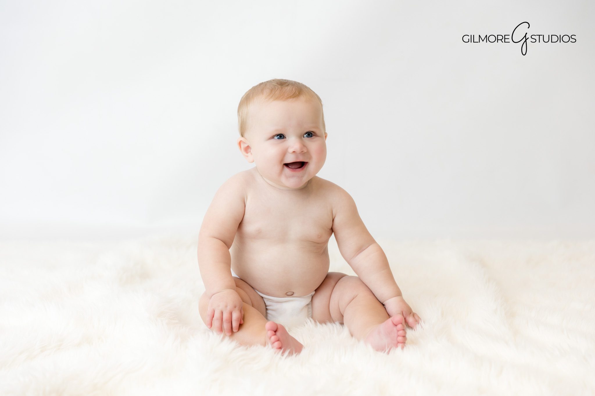 Neutral studio baby portrait by OC milestone photographer

Sitter session photographer capturing baby’s personality