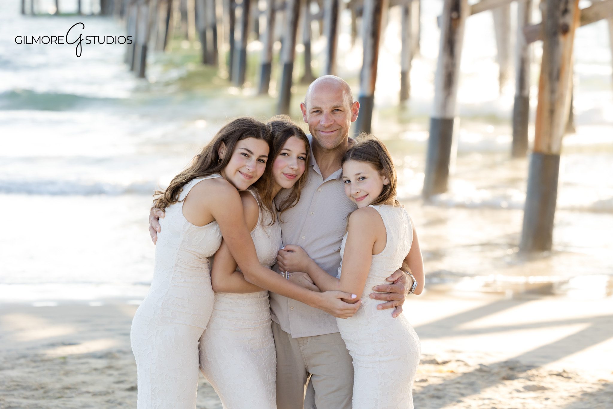 Orange County beach photographer documenting joyful family interactions.

Extended family photography featuring siblings and their families together.