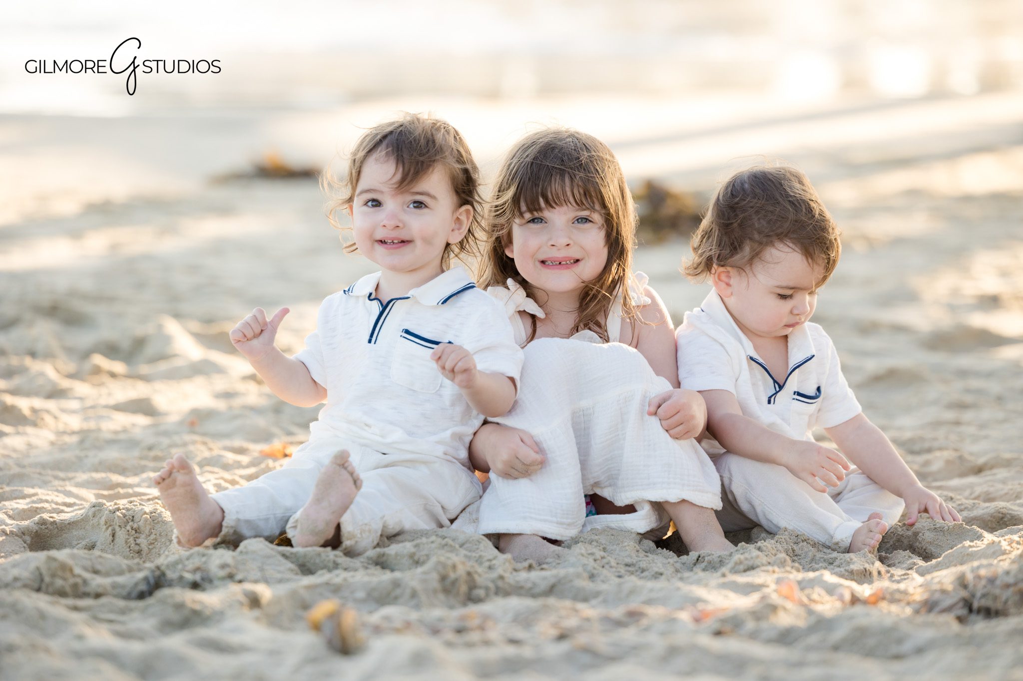 Newport Pier family photography highlighting movement and natural smiles.

Coastal portrait photography featuring extended family near water’s edge.