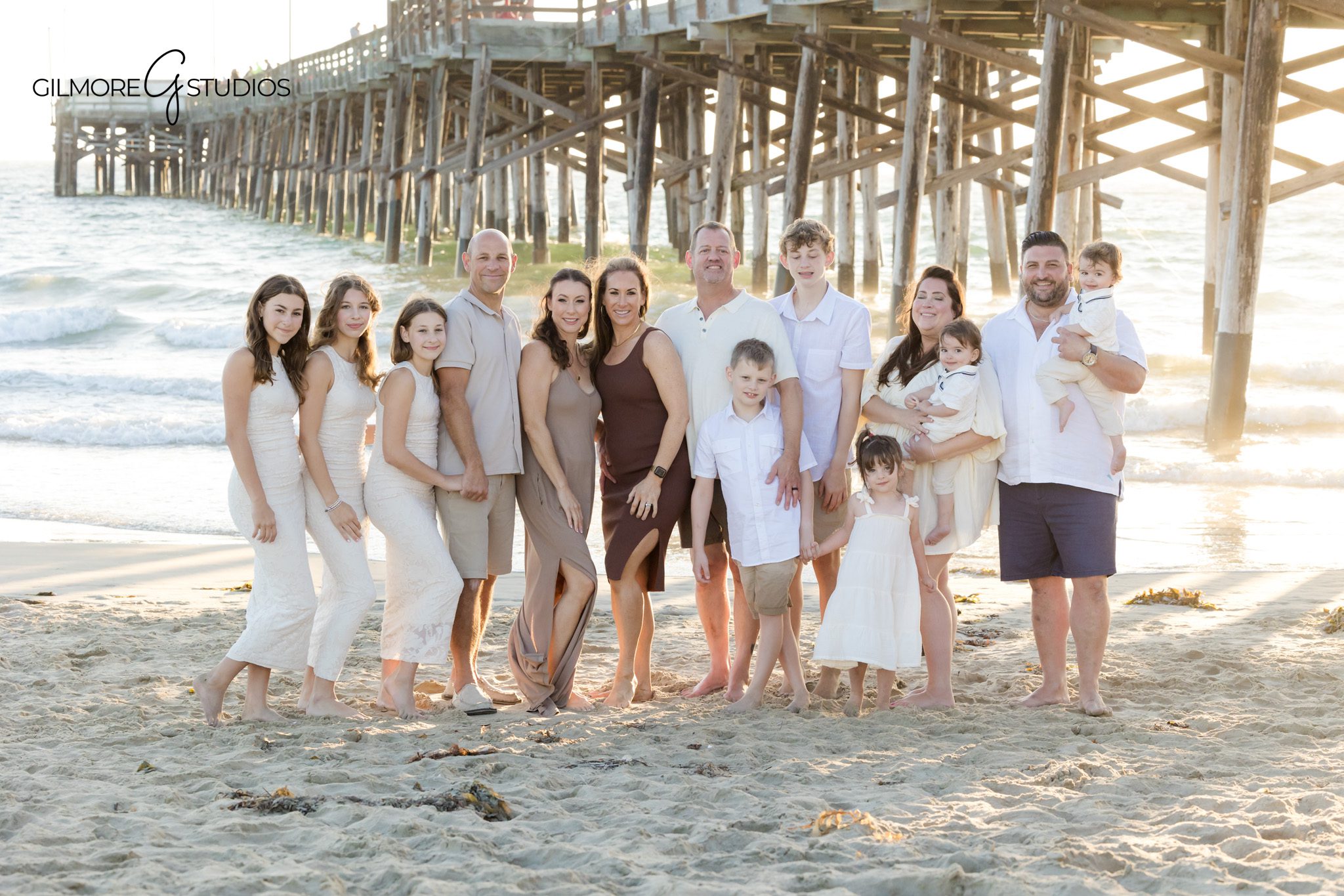 Newport Pier family photography showing movement and connection.

Grandparent-centered family portrait with OC beach photographer.