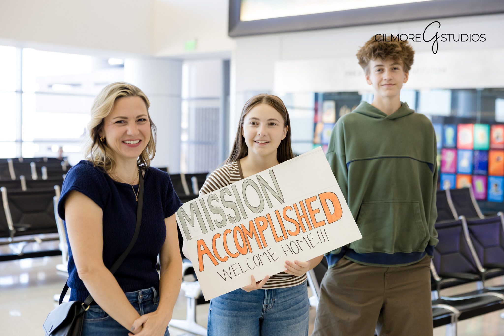 LDS missionary emotional family reunion at PHX by Gilmore Studios photographer

Missionary returning home to Phoenix Arizona photographed at Sky Harbor Airport