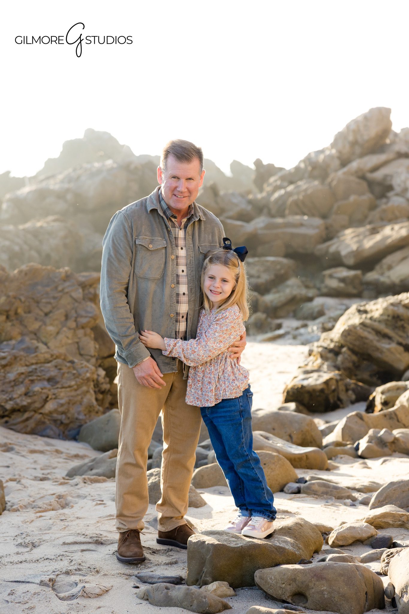 Orange County beach photographer capturing kids exploring tide pools at CdM.

Gilmore Studios family photographer photographing laughter on the shoreline.