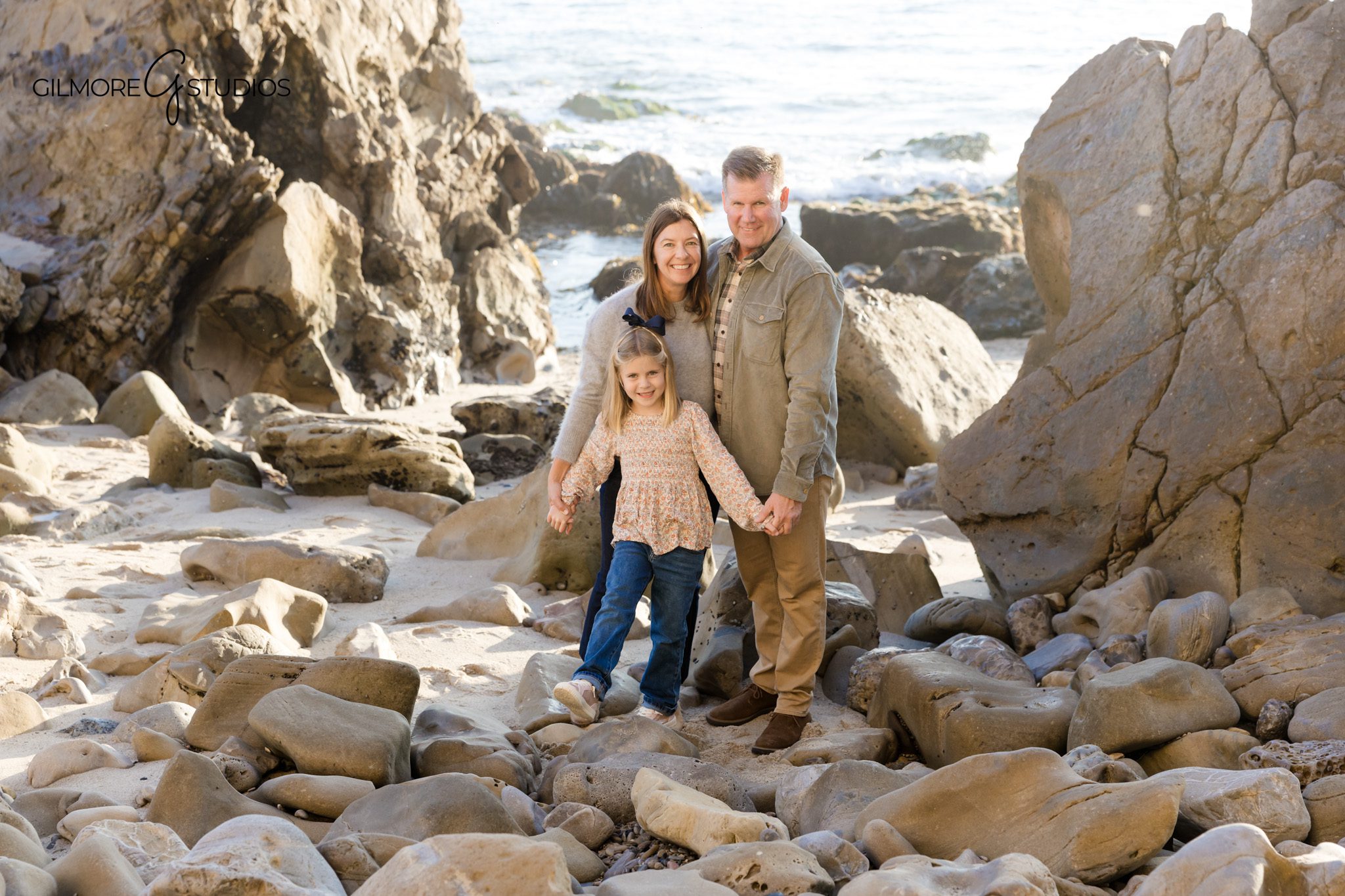 Corona del Mar beach family photographer capturing natural portraits in Orange County.

Family photography session at Corona del Mar with Gilmore Studios.
