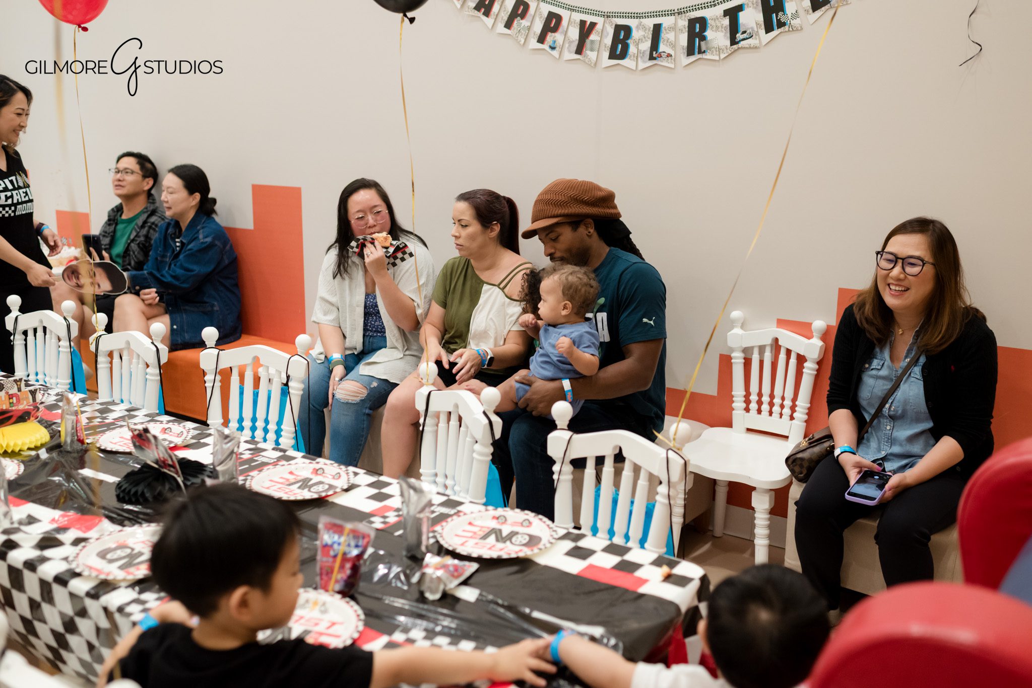 Birthday party photography of guests singing happy birthday at PlayPie.

Event photographer documenting friends playing in bright PlayPie activity zones.
