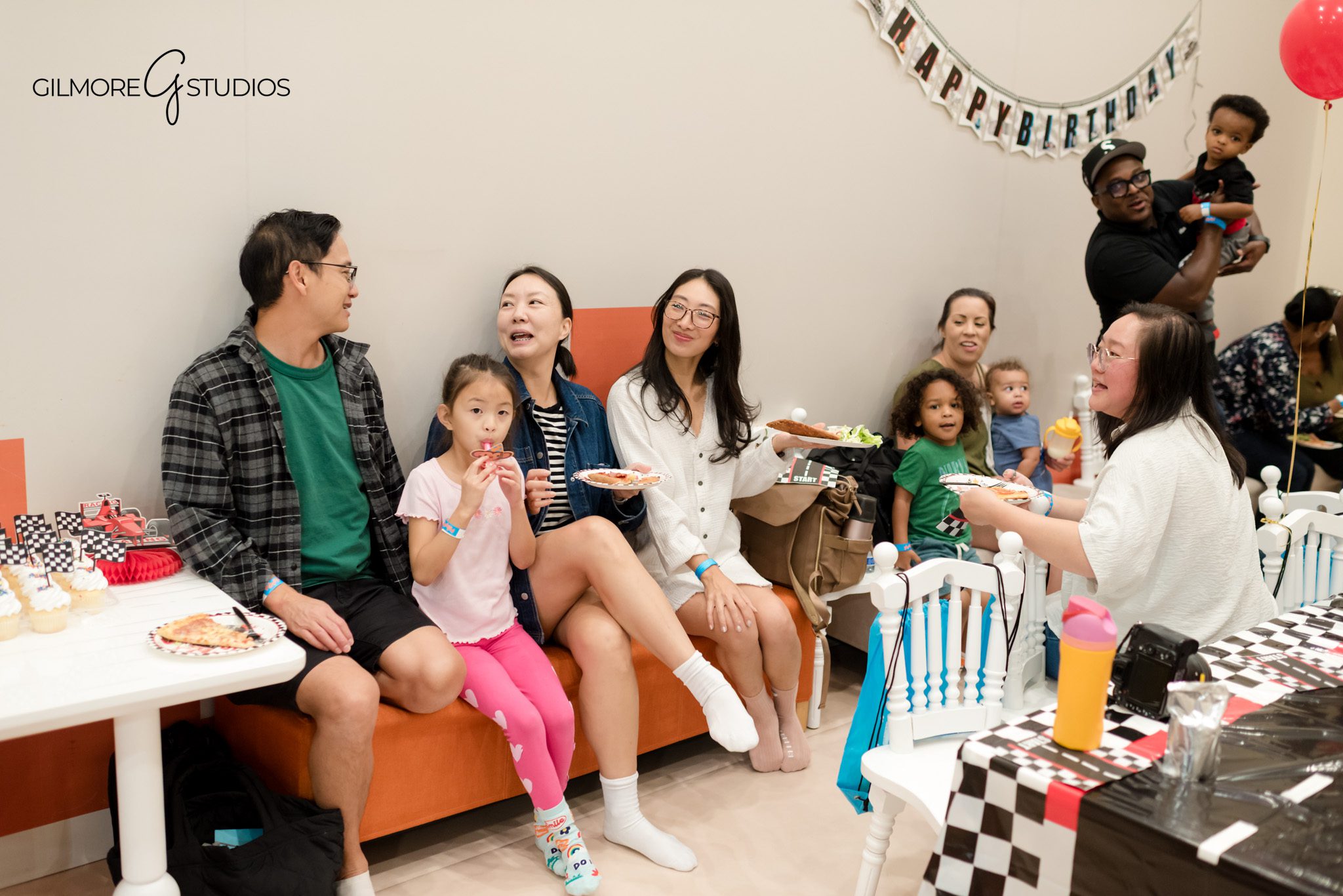 Professional PlayPie photographer documenting party room setup before guests.

Portrait photography of family gathered around birthday child at PlayPie.