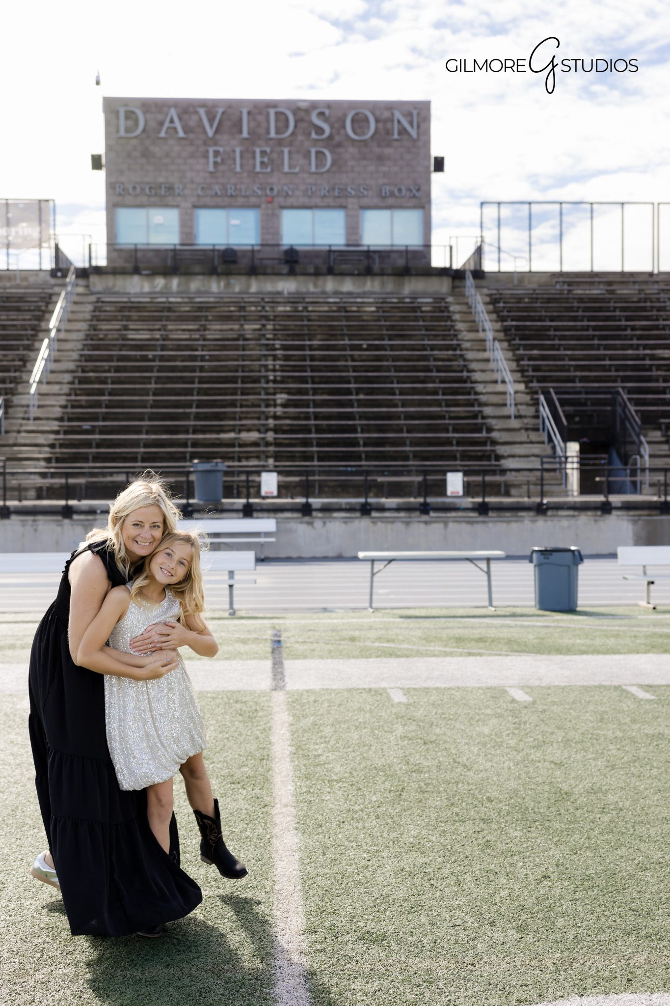Orange County outdoor portrait photography with soft greenery.

OC family photographer capturing sunset movement on the beach.