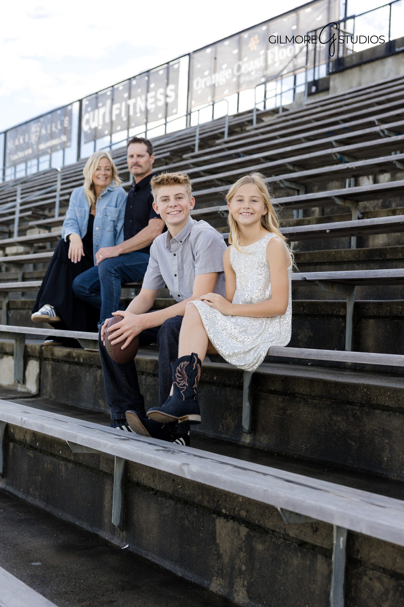 Family photographer capturing parents embracing at golden hour.

Laguna Beach portrait photographer capturing coastal family session.