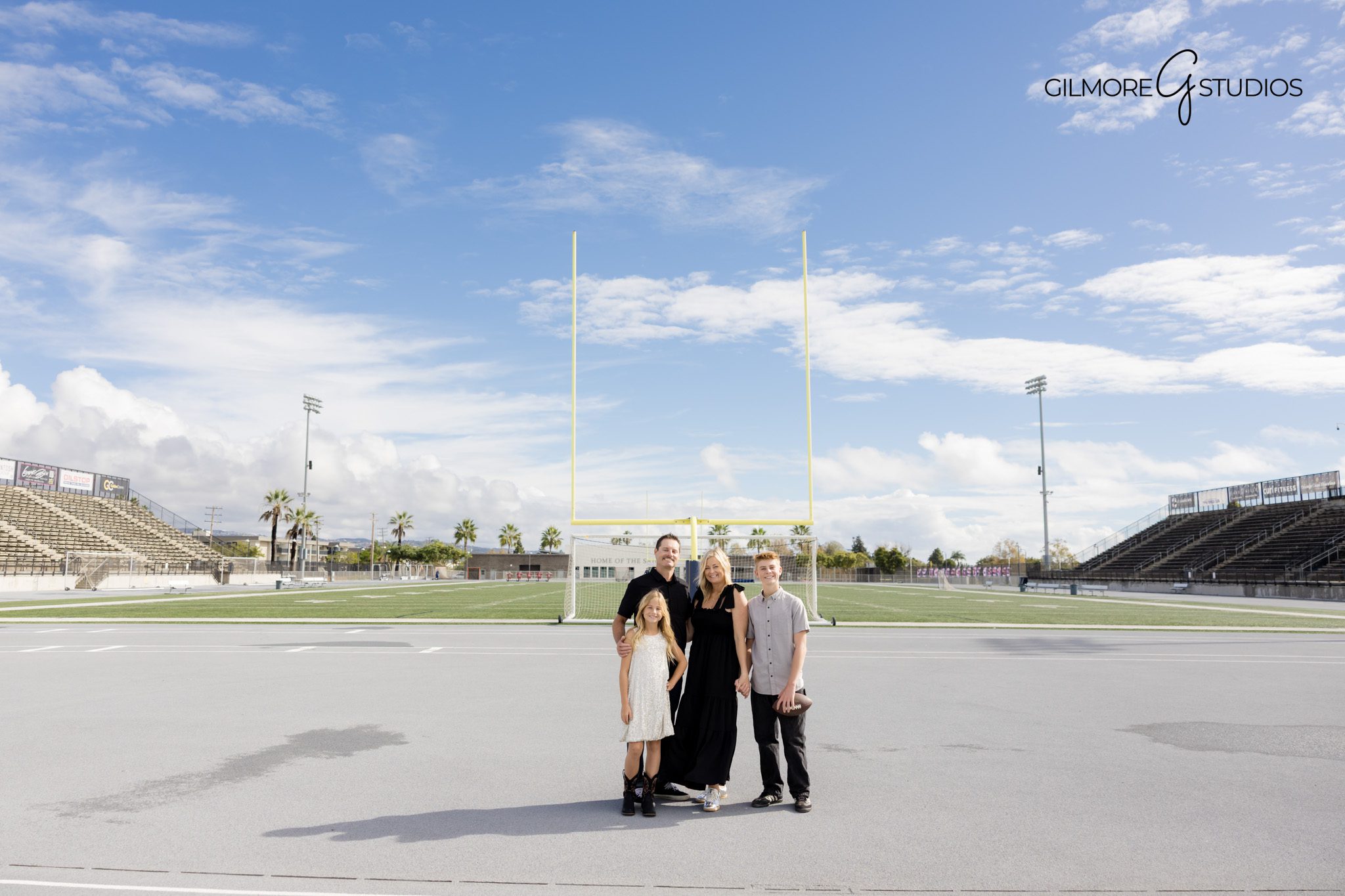 Newport Beach Pier family photography with warm evening glow.

Orange County portrait photographer capturing siblings running.