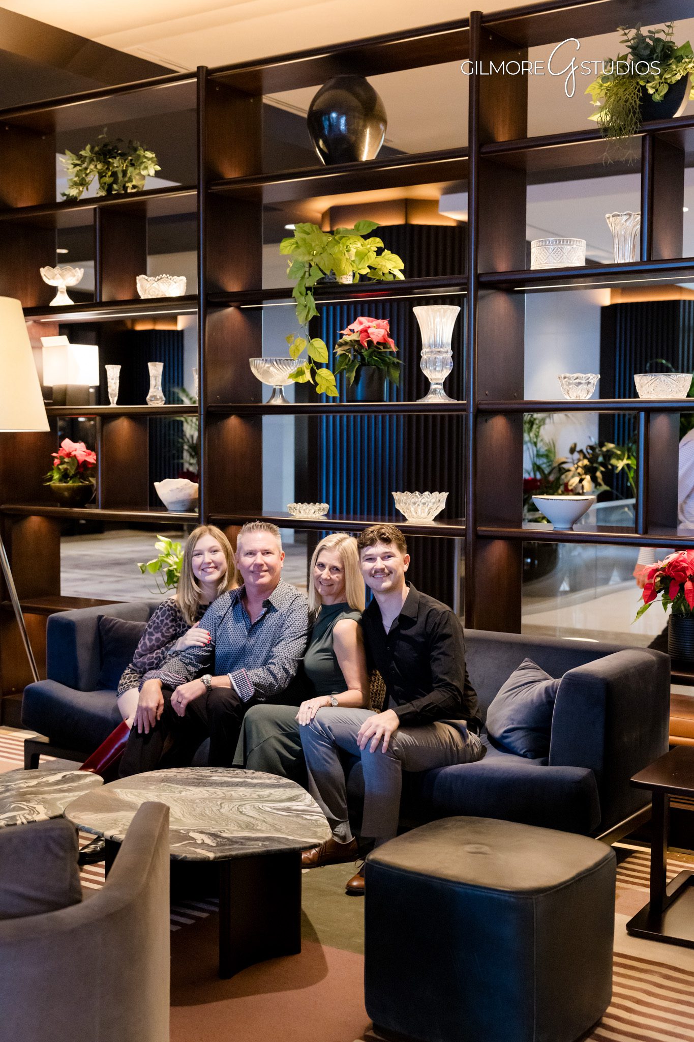 Family portraits in Newport Beach captured during gentle rain.

Best photographer in Newport Beach photographing family in raincoats.