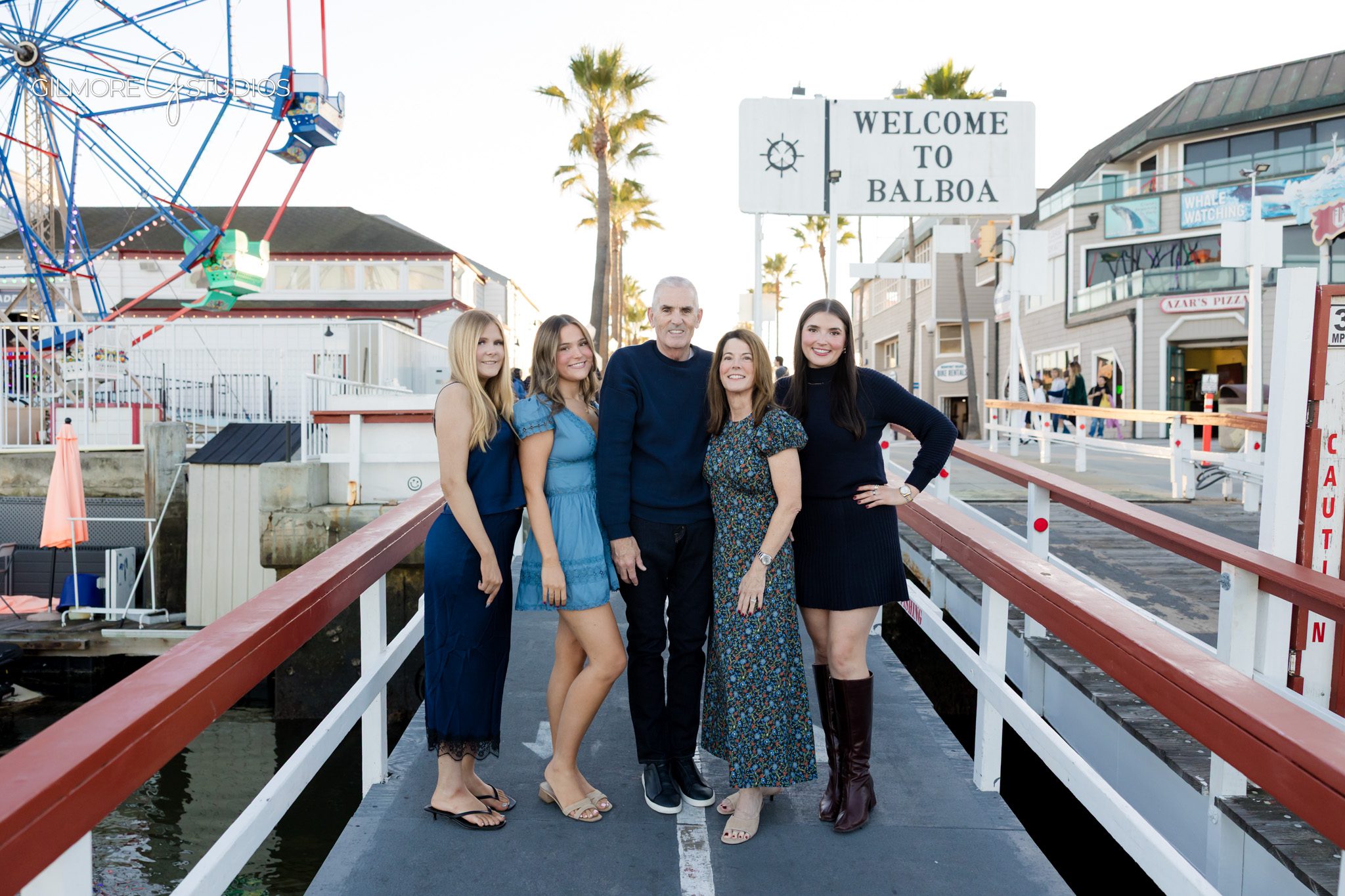 Balboa Island family photographer capturing holiday portraits near the waterfront,

Holiday family photography on Balboa Island with Gilmore Studios,